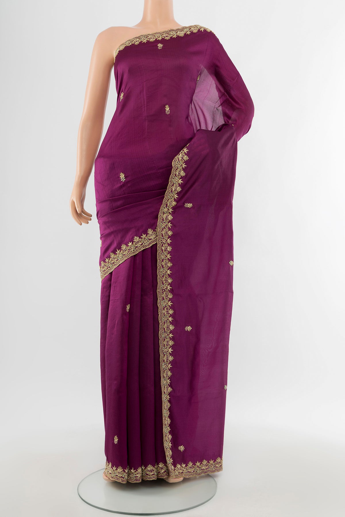 Purple Art Silk Saree with Embroidery on the body and Embroidery Border.  displayed on a mannequin