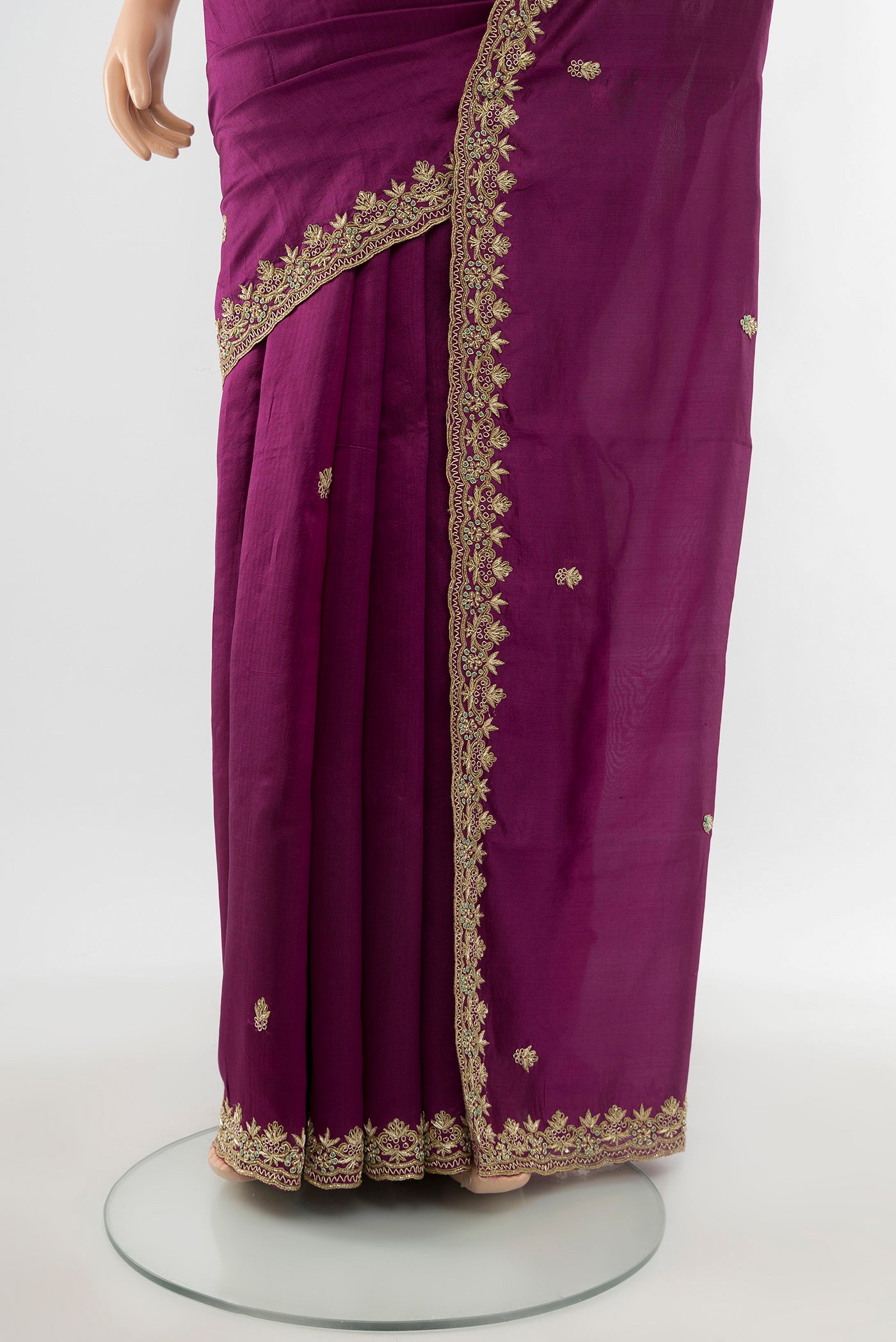 Pleats and pallu of Purple Art Silk Saree with Embroidery on the body and Embroidery Border. 