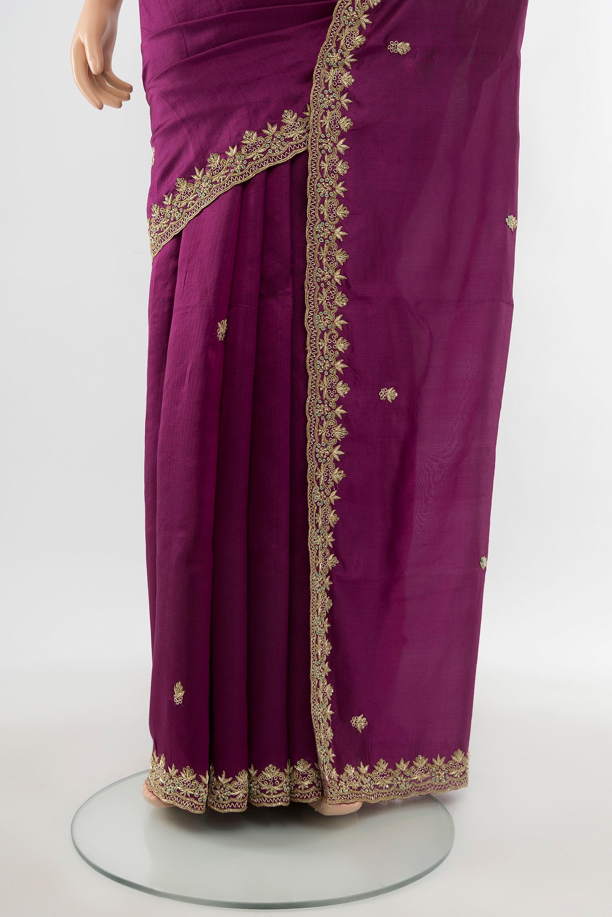 Pleats and pallu of Purple Art Silk Saree with Embroidery on the body and Embroidery Border. 