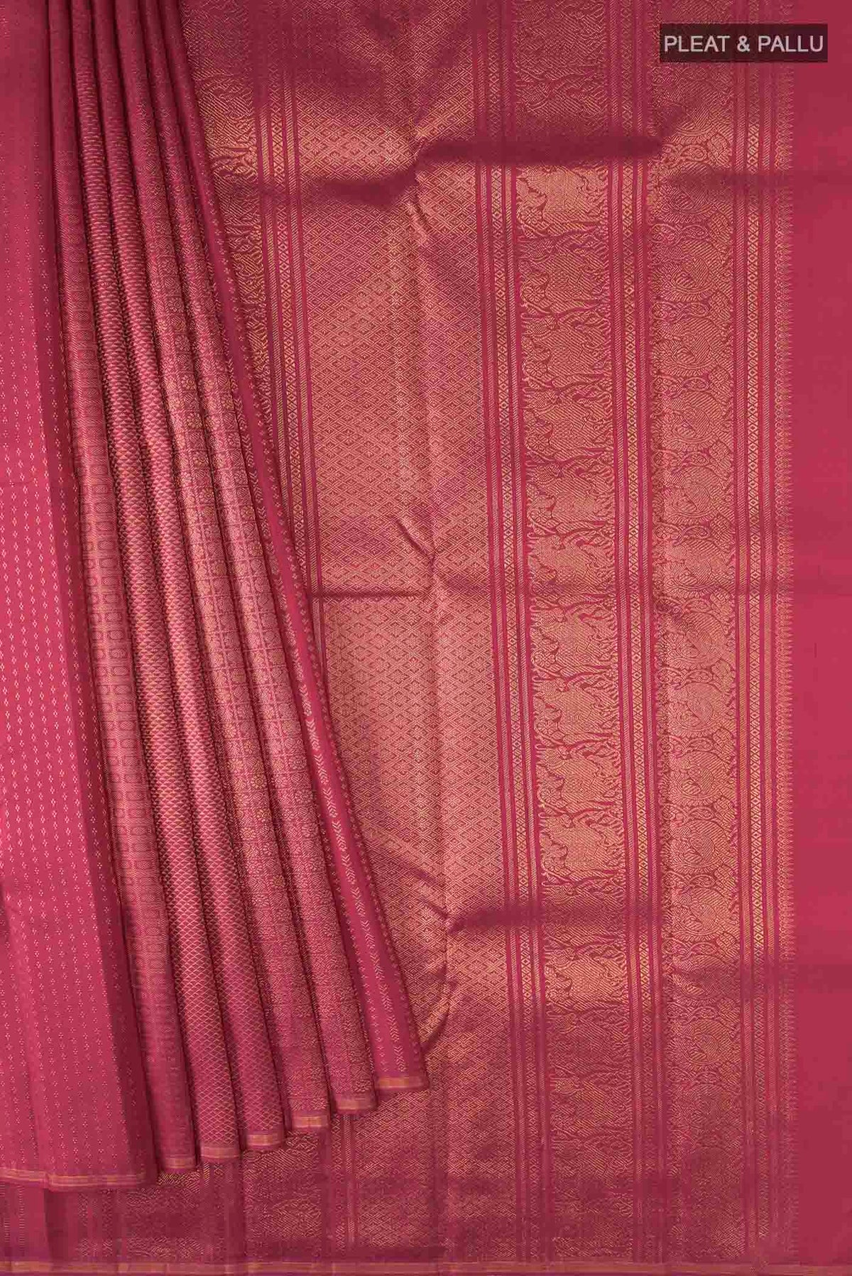 Pleats and pallu of Pure Silk Pure Zari Maroon Kanchipuram Saree with Zari Brocade on the body and Zari Border