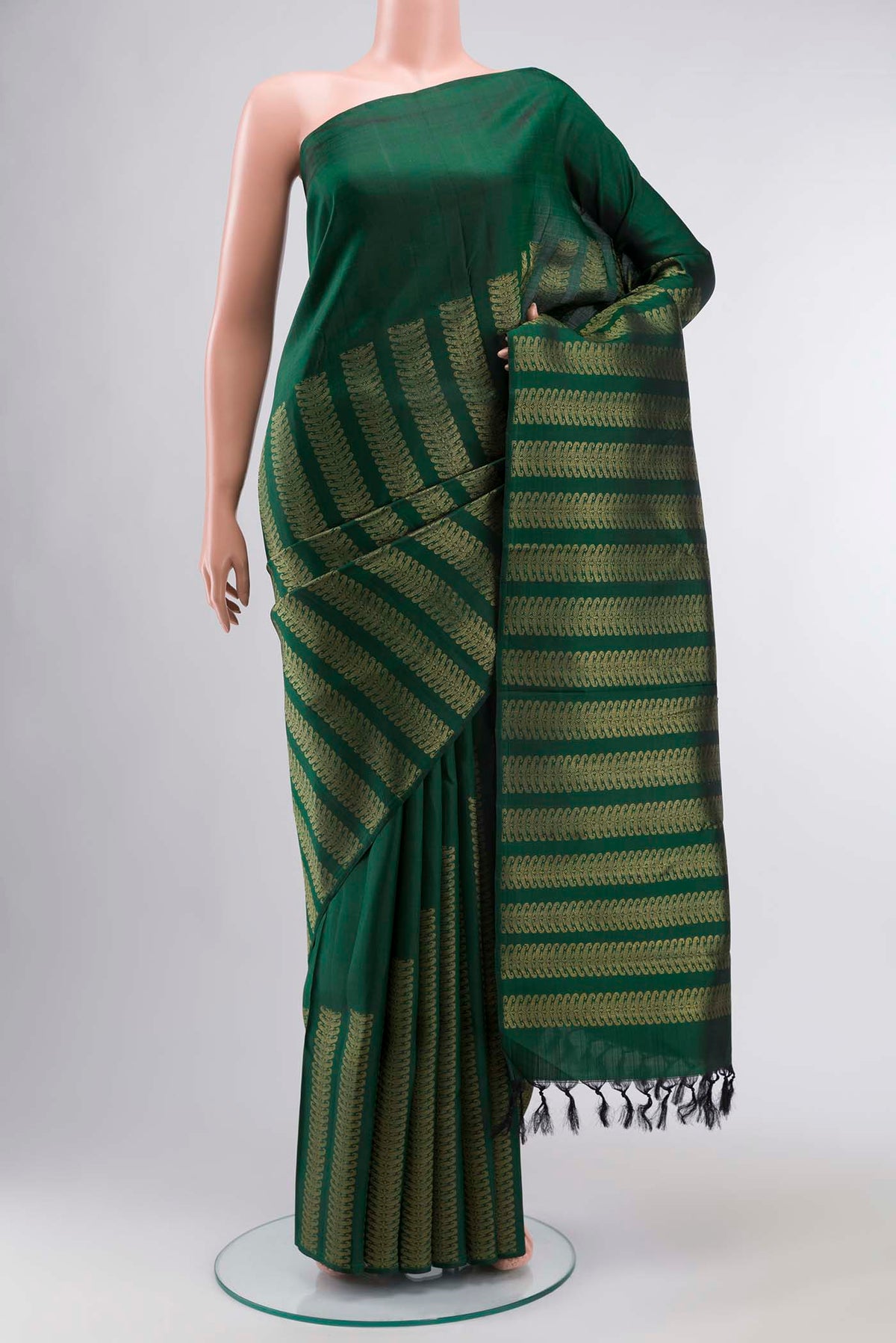 Green Kanchipuram Silk Saree with Stripes on the body and Without Border displayed on a mannequin
