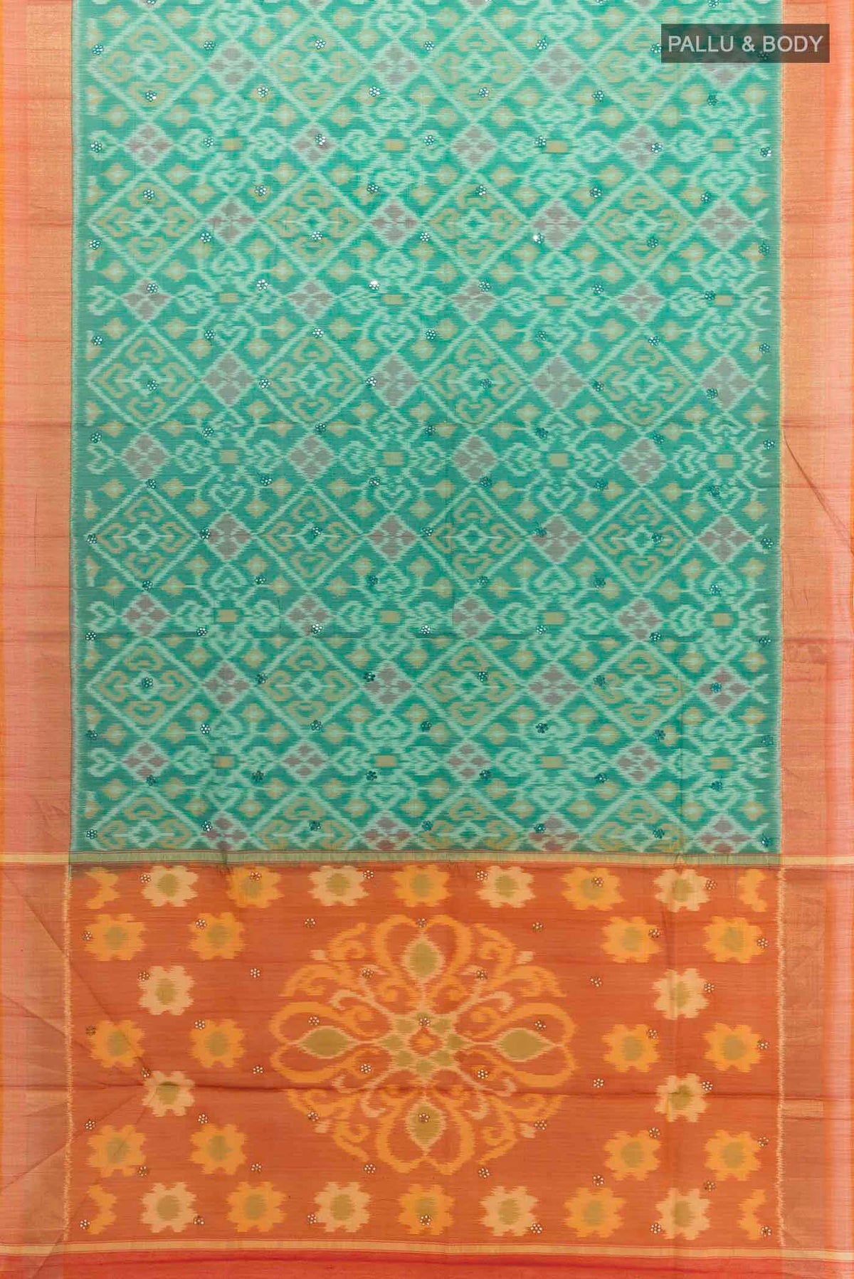 Flat view of Green Silk Cotton Saree with Ikat design on the body and Zari Border