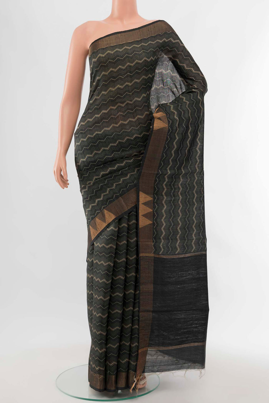 Black Tussar Silk Saree with Zari Butta on the body and Silk Border displayed on a mannequin