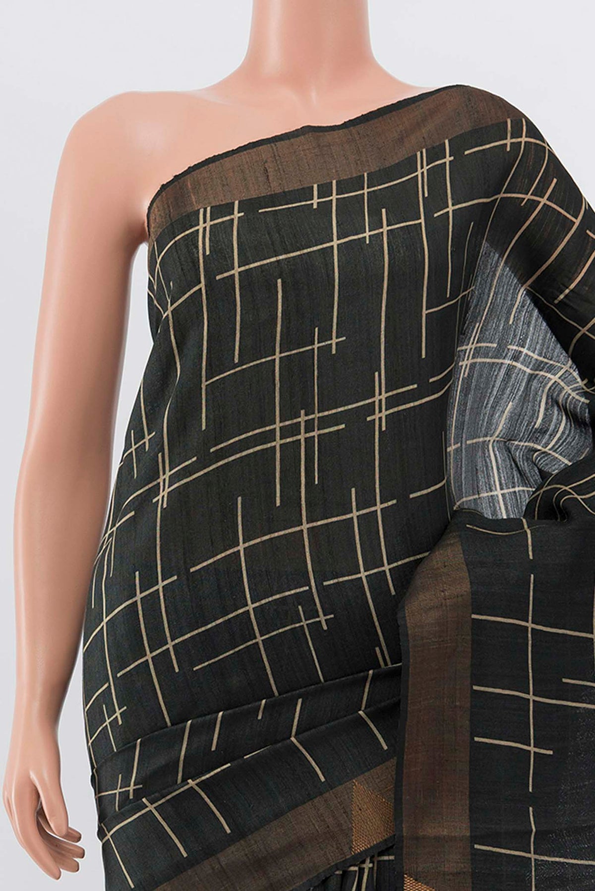 Border image of Grey Tussar Silk Saree with Printed design on the body and Zari Border