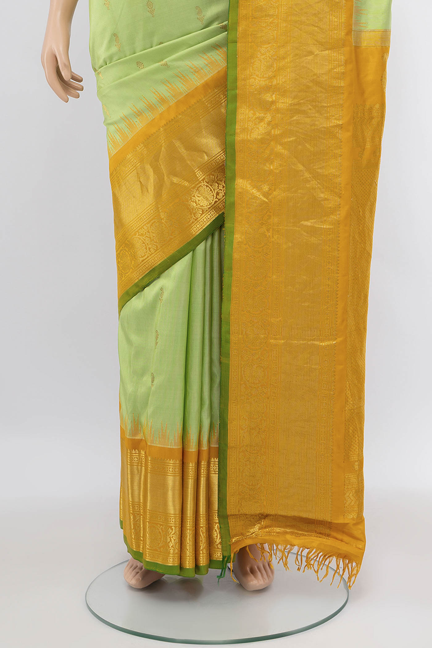 Pleats and pallu of Pista Green Gadwal Silk Saree with Zari Brocade on the body and Silk Border