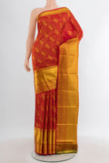 Red Kanjivaram Silk Saree with Zari Brocade on the body and Zari Border.  displayed on a mannequin