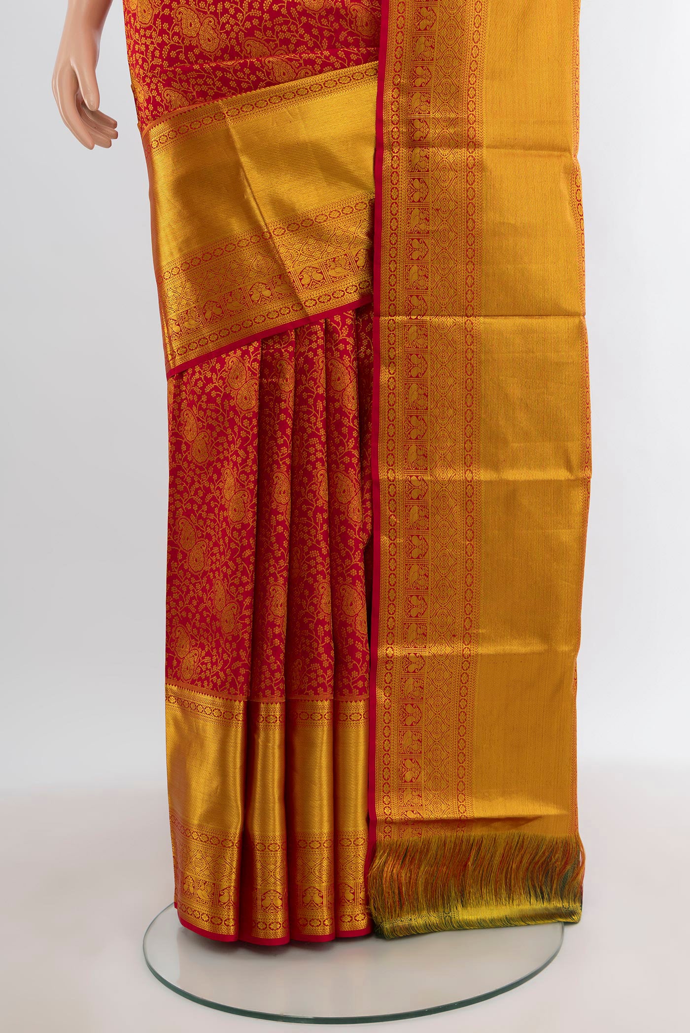 Pleats and pallu of Red Kanjivaram Silk Saree with Zari Brocade on the body and Zari Border. 