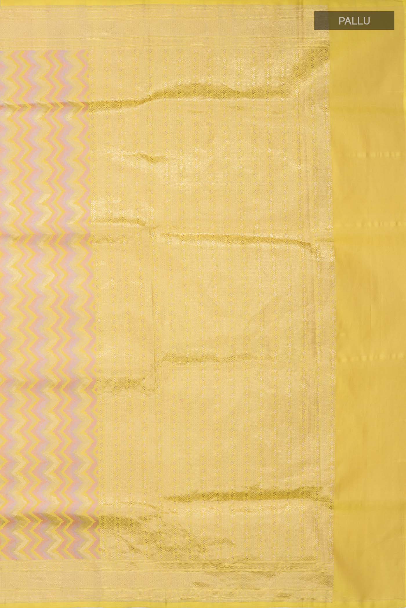 Close up image of the pallu of Yellow Banarasi Silk Saree with Zig Zag design on the body and Zari Border