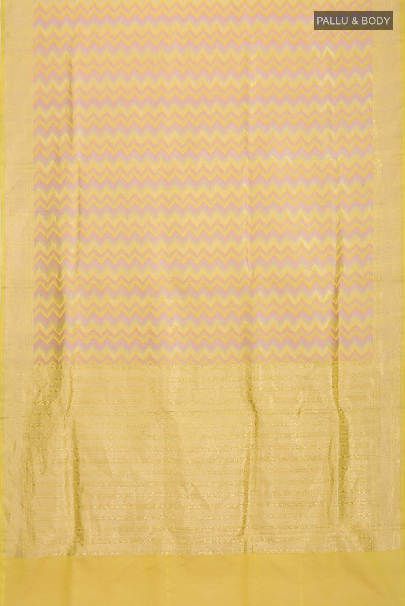 Flat view of Yellow Banarasi Silk Saree with Zig Zag design on the body and Zari Border