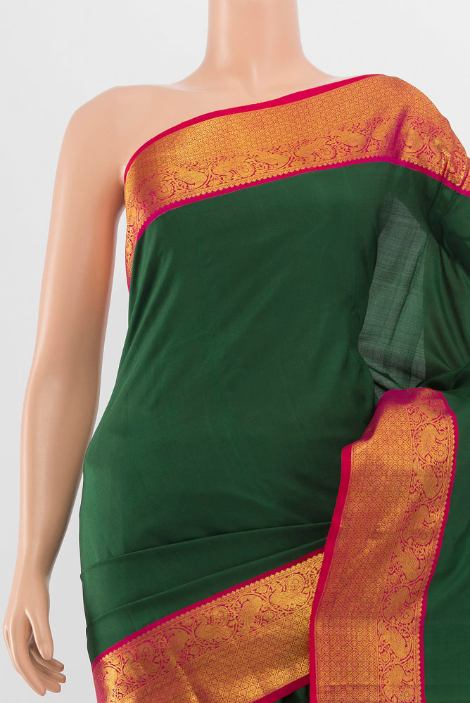 Border image of Pure Silk Pure Zari Mint Green Kanjivaram Saree with Zari Butta on the body and Silk Border. 