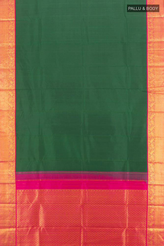 Flat view of Pure Silk Pure Zari Mint Green Kanjivaram Saree with Zari Butta on the body and Silk Border. 
