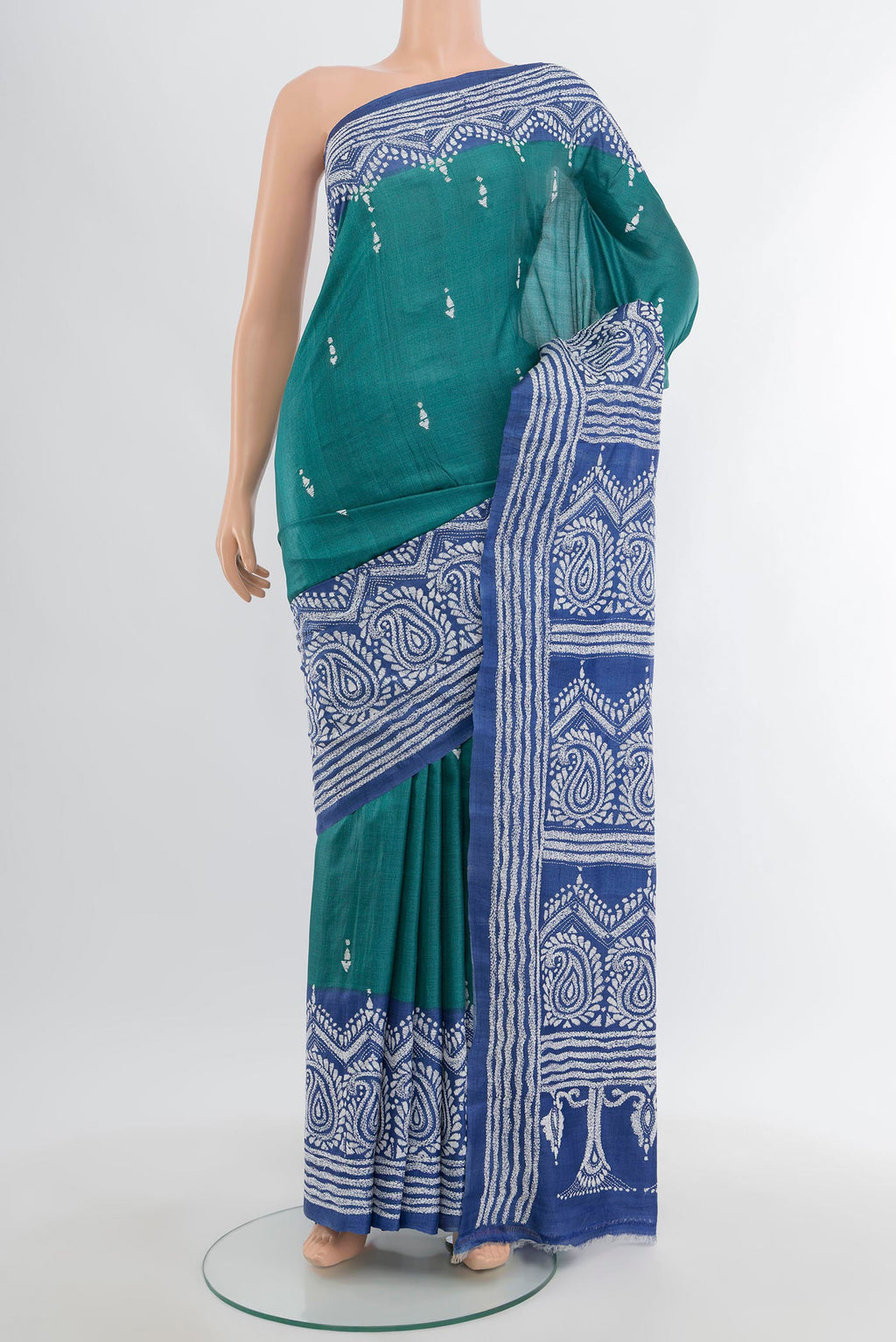 Green Tussar Silk Saree with Kantha Work on the body and Embroidery Border.  displayed on a mannequin