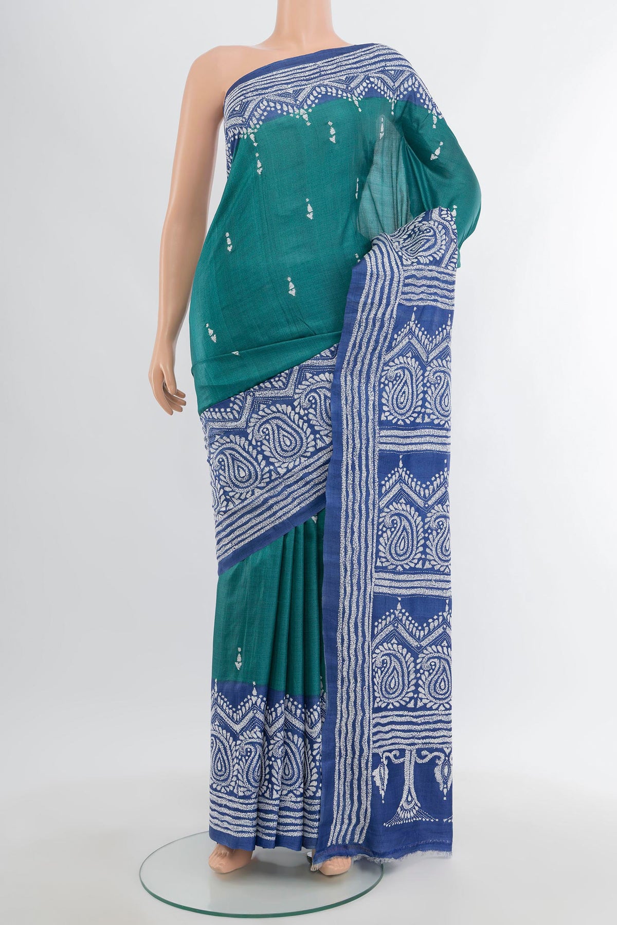 Green Tussar Silk Saree with Kantha Work on the body and Embroidery Border.  displayed on a mannequin