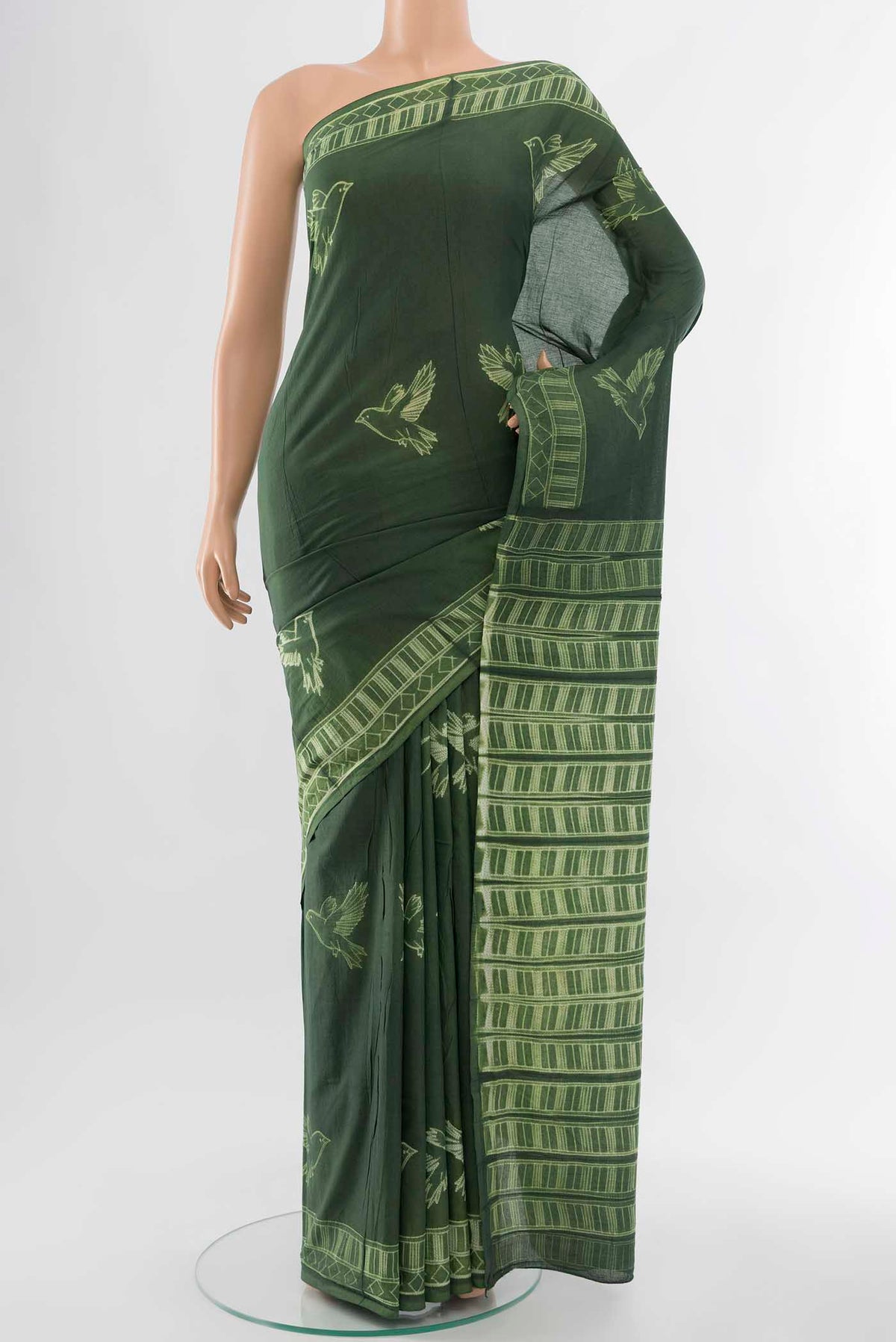 Bottle Green Chanderi Silk Cotton Saree with Printed design on the body and Printed Border displayed on a mannequin