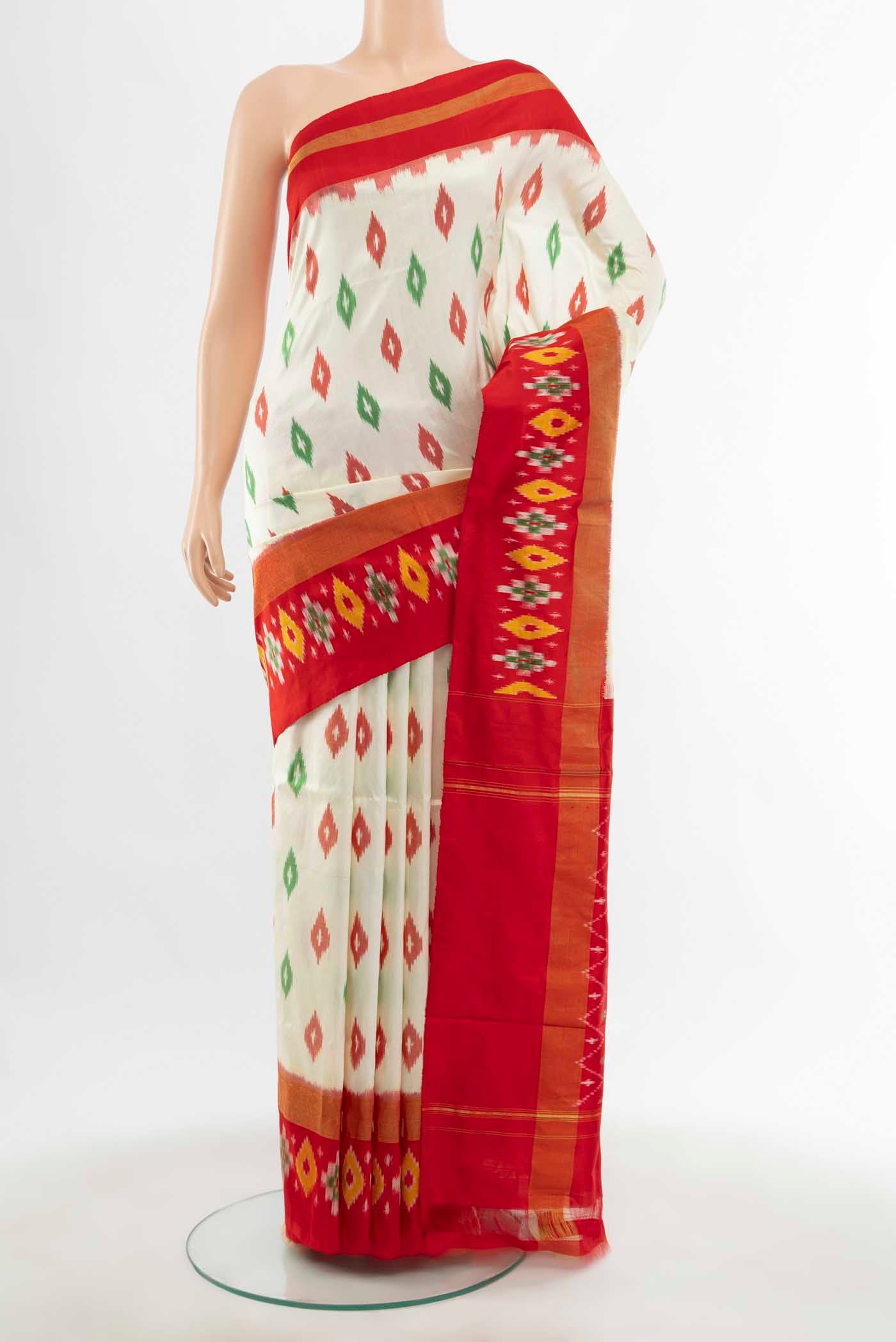 Cream Pochampally Saree with Ikat Print on the body and Silk Border displayed on a mannequin