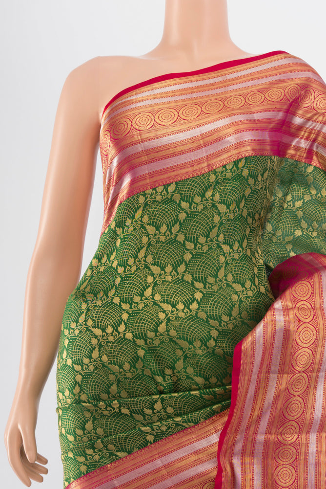 Border image of Pure Silk Pure Zari Bottle Green Kanchipuram Saree with Zari Butta on the body and Silk Border. 