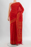 Red Soft Silk Saree with Zari Butta on the body and Zari Border.  displayed on a mannequin