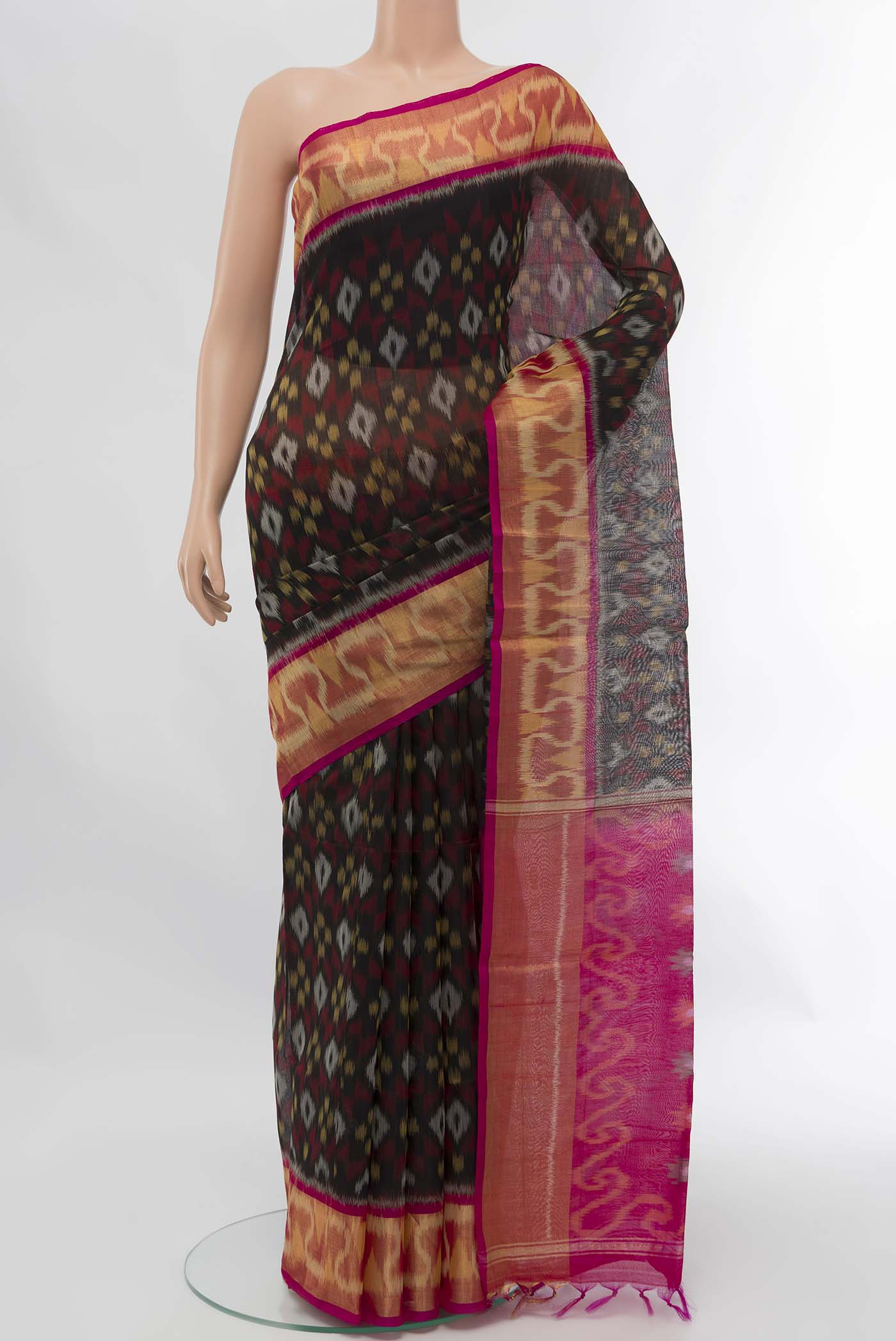 Black Silk Cotton Saree with Zari Butta on the body and Silk Border displayed on a mannequin