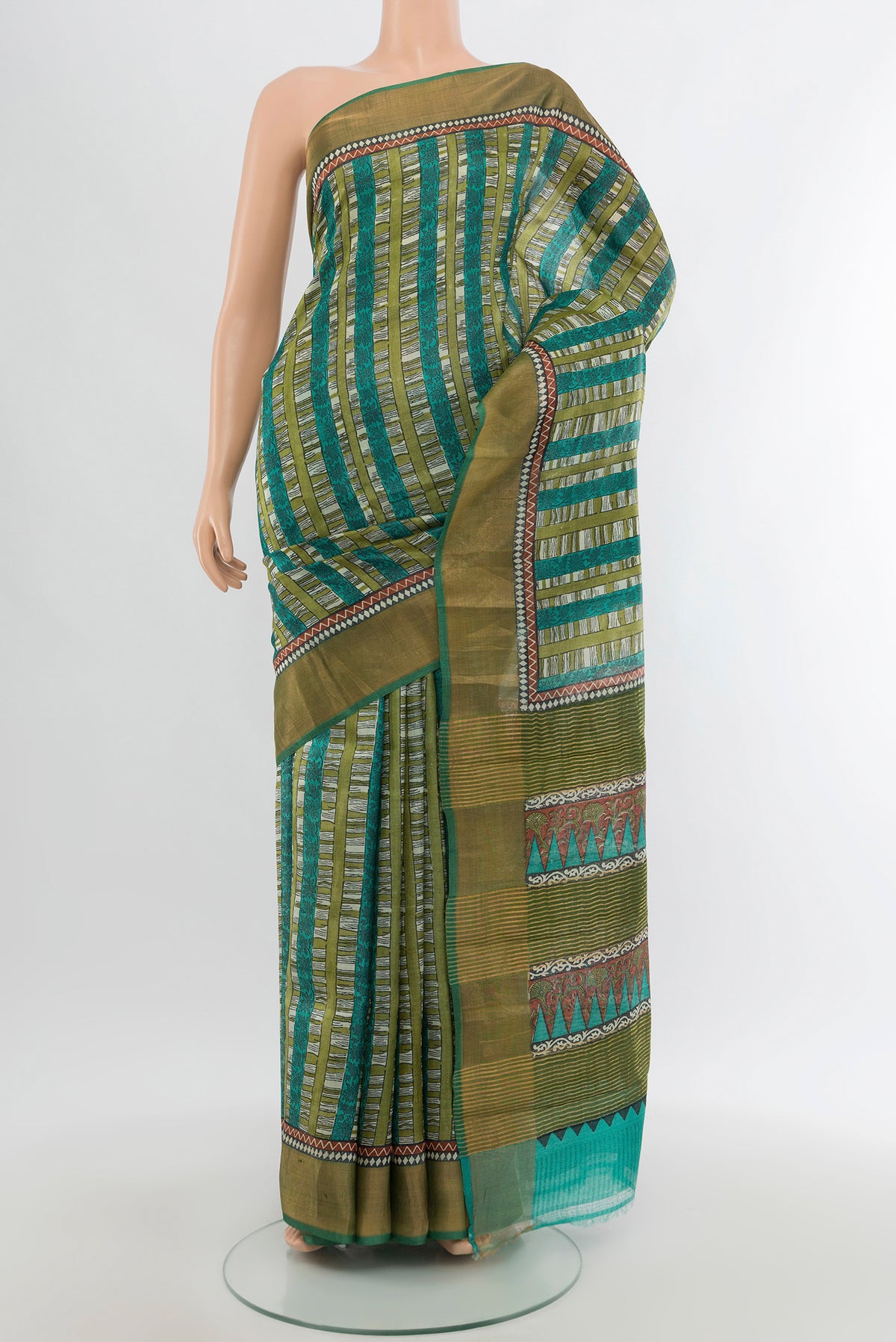 Multi Color Tussar Silk Saree with Printed design on the body and Zari Border.  displayed on a mannequin