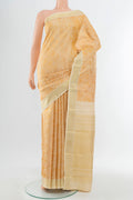 Golden Kanchipuram Silk Saree with Zari Butta on the body and Silk Border.  displayed on a mannequin