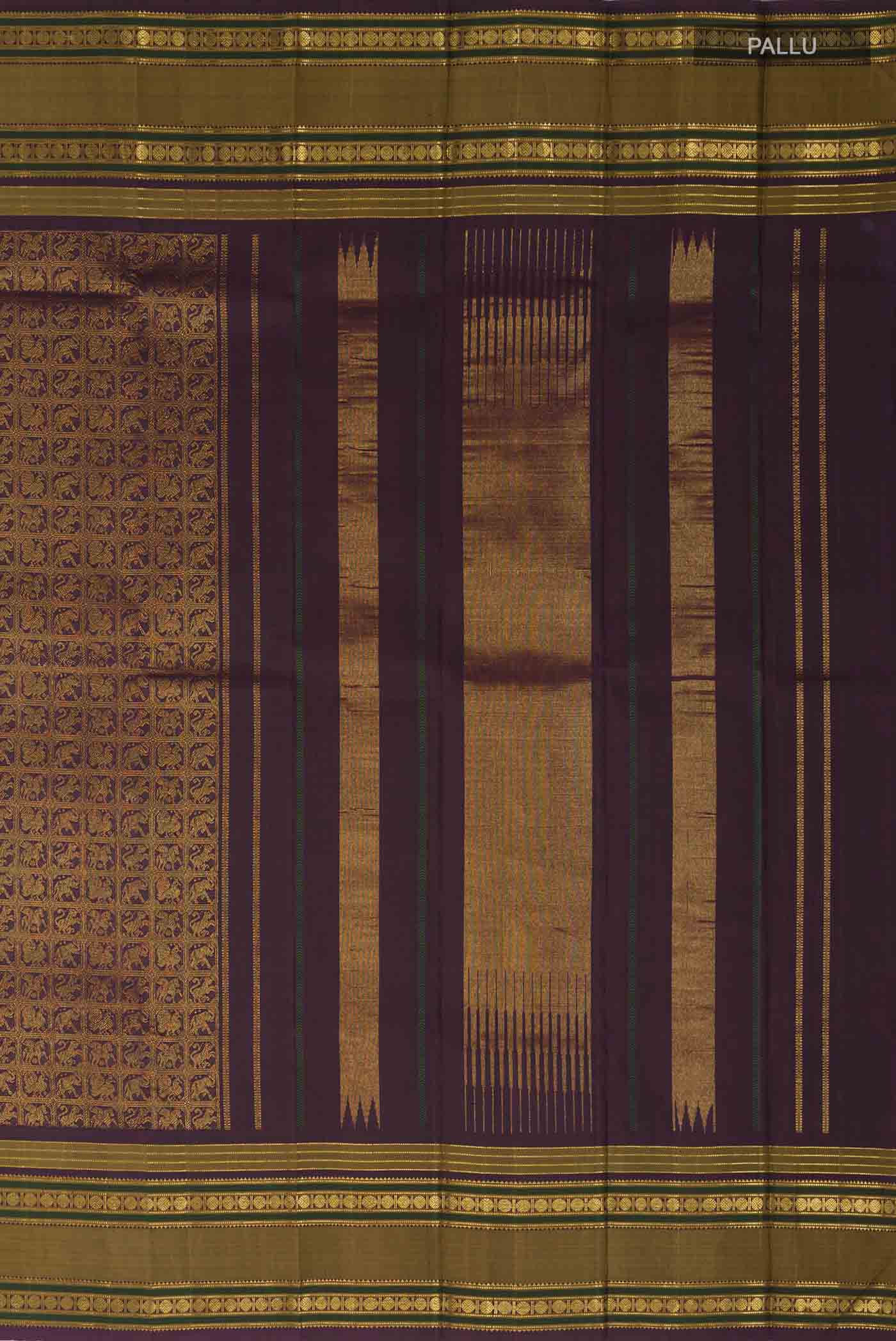 Close up image of the pallu of Burgundy Kanchipuram Silk Saree with Zari Brocade on the body and Zari Border