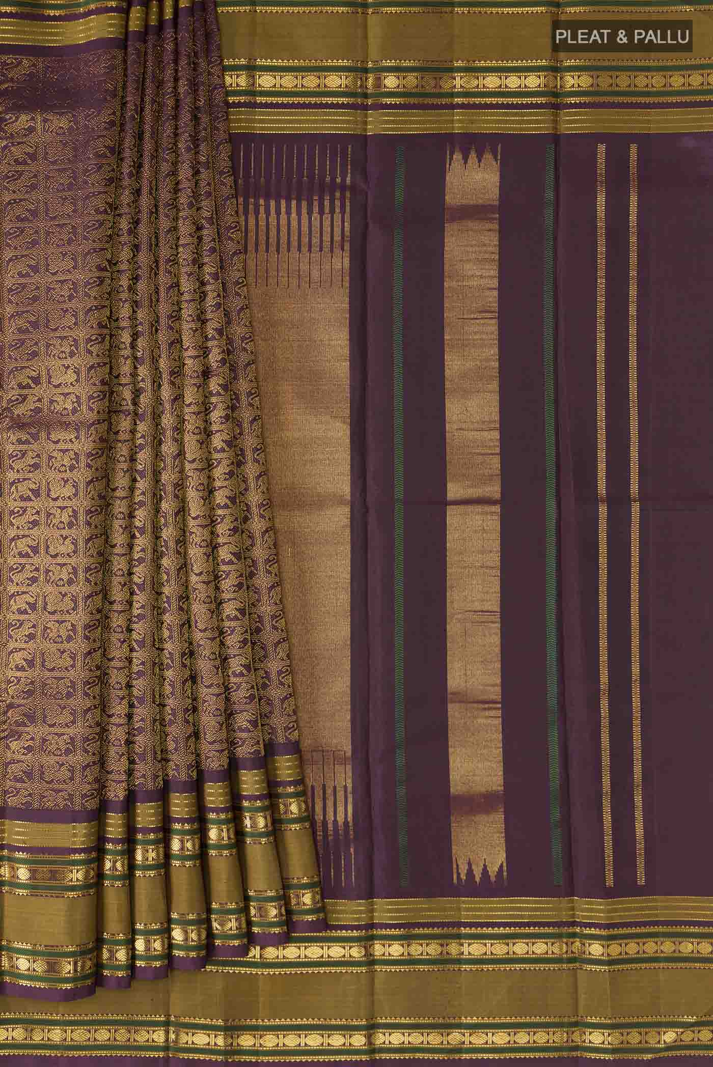 Pleats and pallu of Burgundy Kanchipuram Silk Saree with Zari Brocade on the body and Zari Border