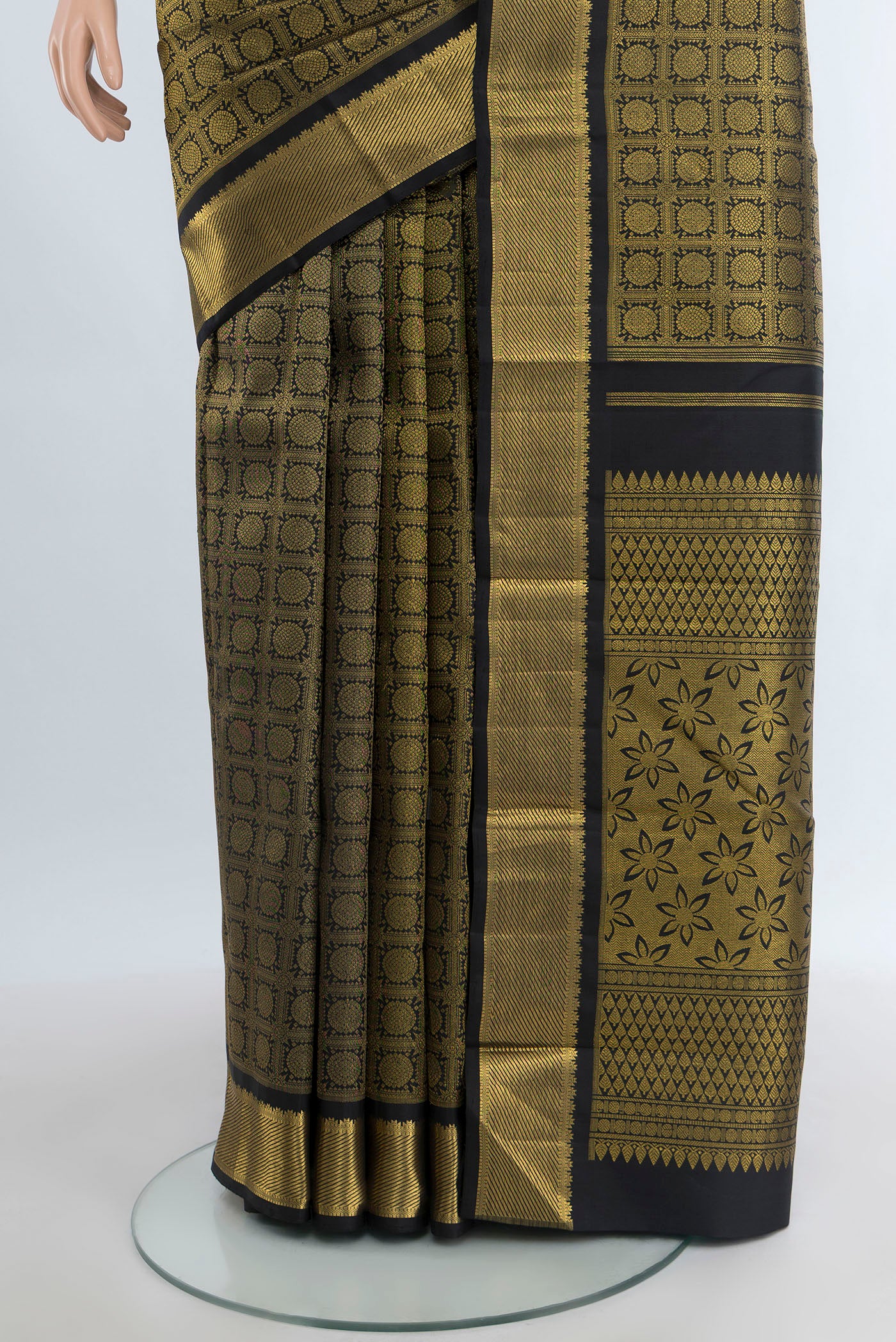 Pleats and pallu of Pure Silk Pure Zari Black Kanjivaram Saree with Zari Brocade on the body and Zari Border. 