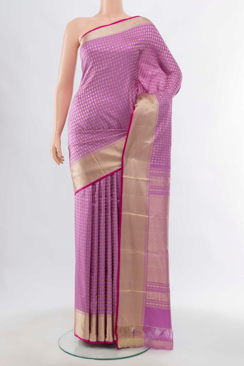 Lavender Kanchipuram Silk Saree with Zari Butta on the body and Silk Border displayed on a mannequin