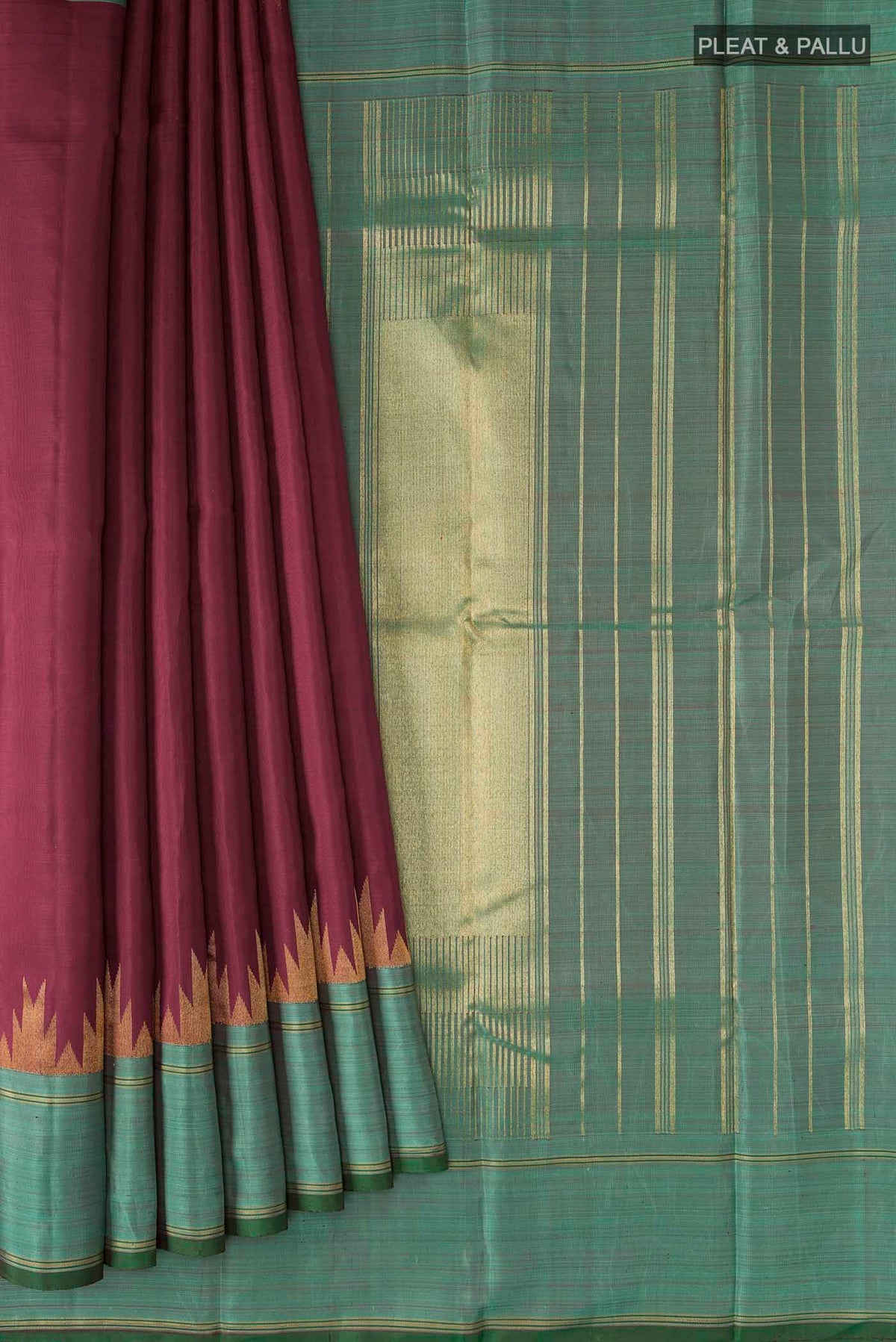 Pleats and pallu of Maroon Kanchipuram Silk Saree with Plain Body and Zari Border