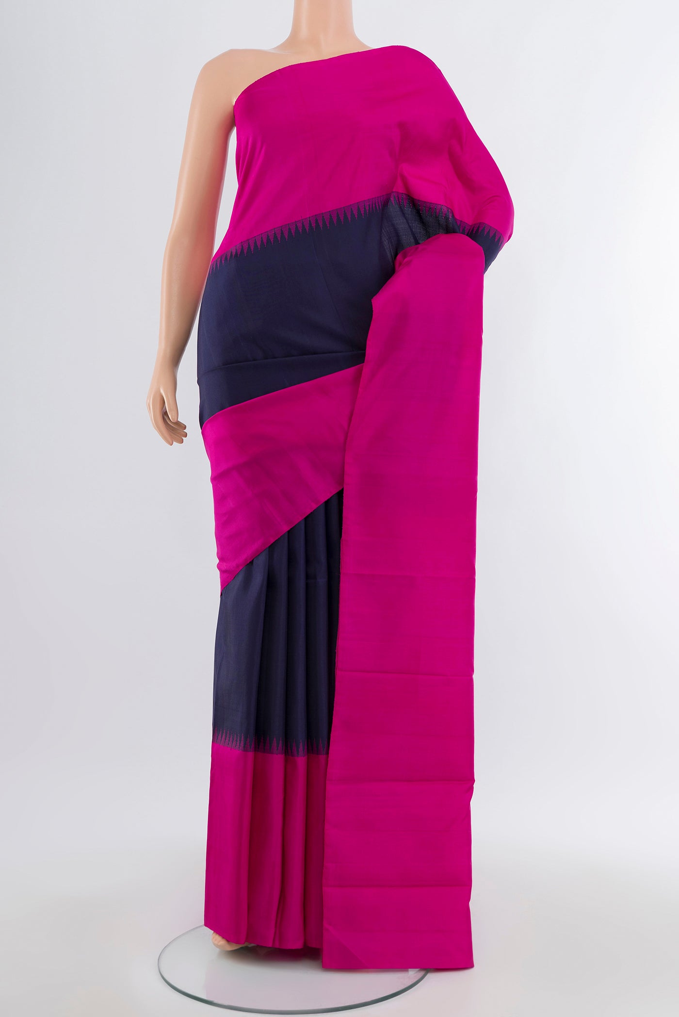 Navy Blue Kanchipuram Silk Saree with Plain Body and Silk Border.  displayed on a mannequin