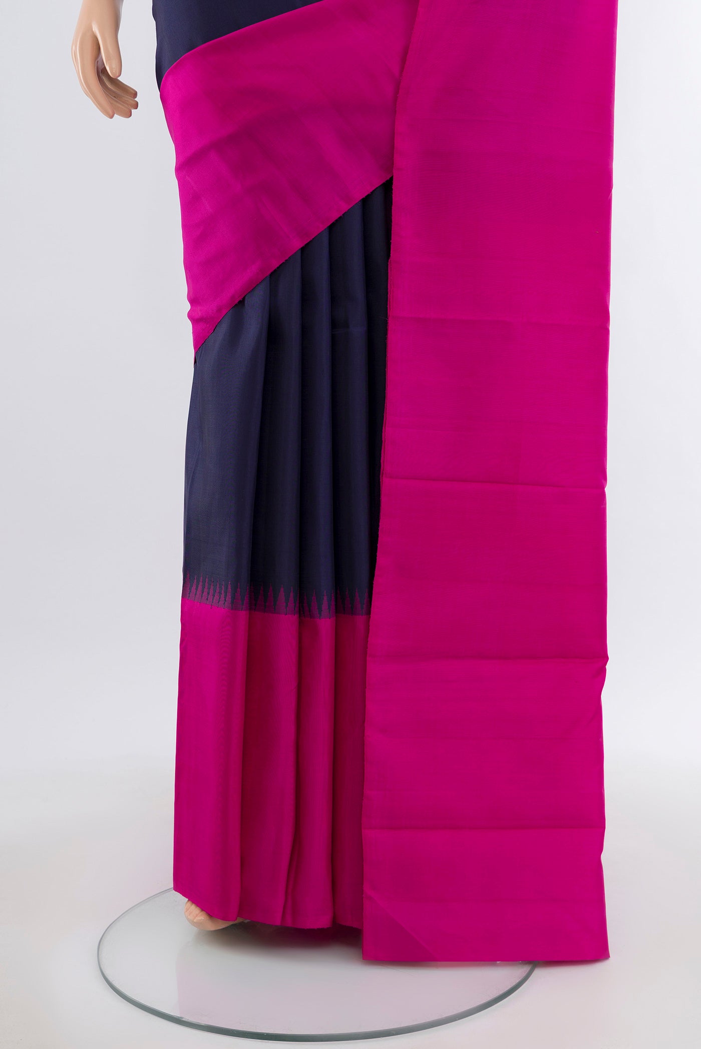 Pleats and pallu of Navy Blue Kanchipuram Silk Saree with Plain Body and Silk Border. 