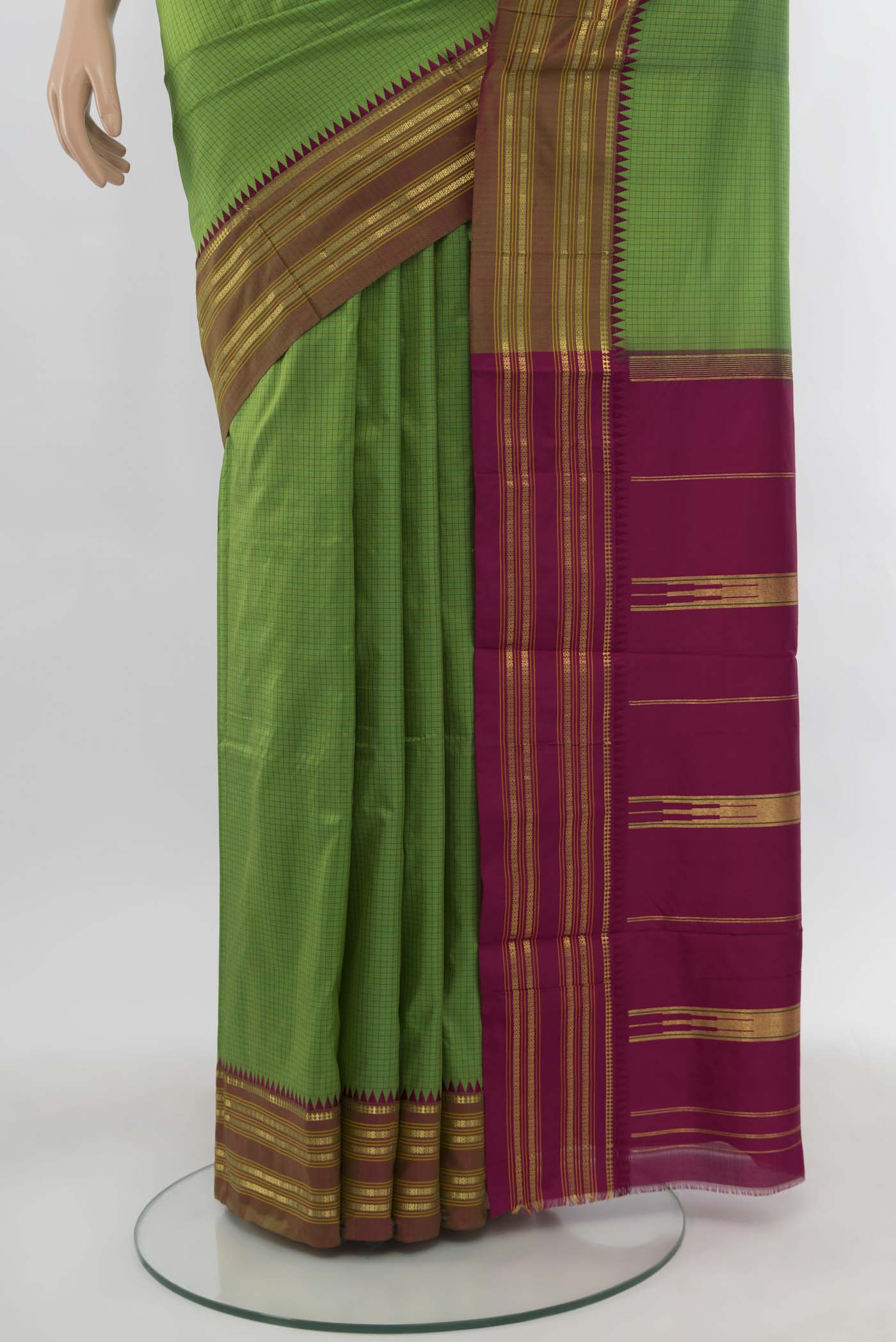 Pleats and pallu of Light Green Narayanpet Silk Saree with Zari Butta on the body and Silk Border. 
