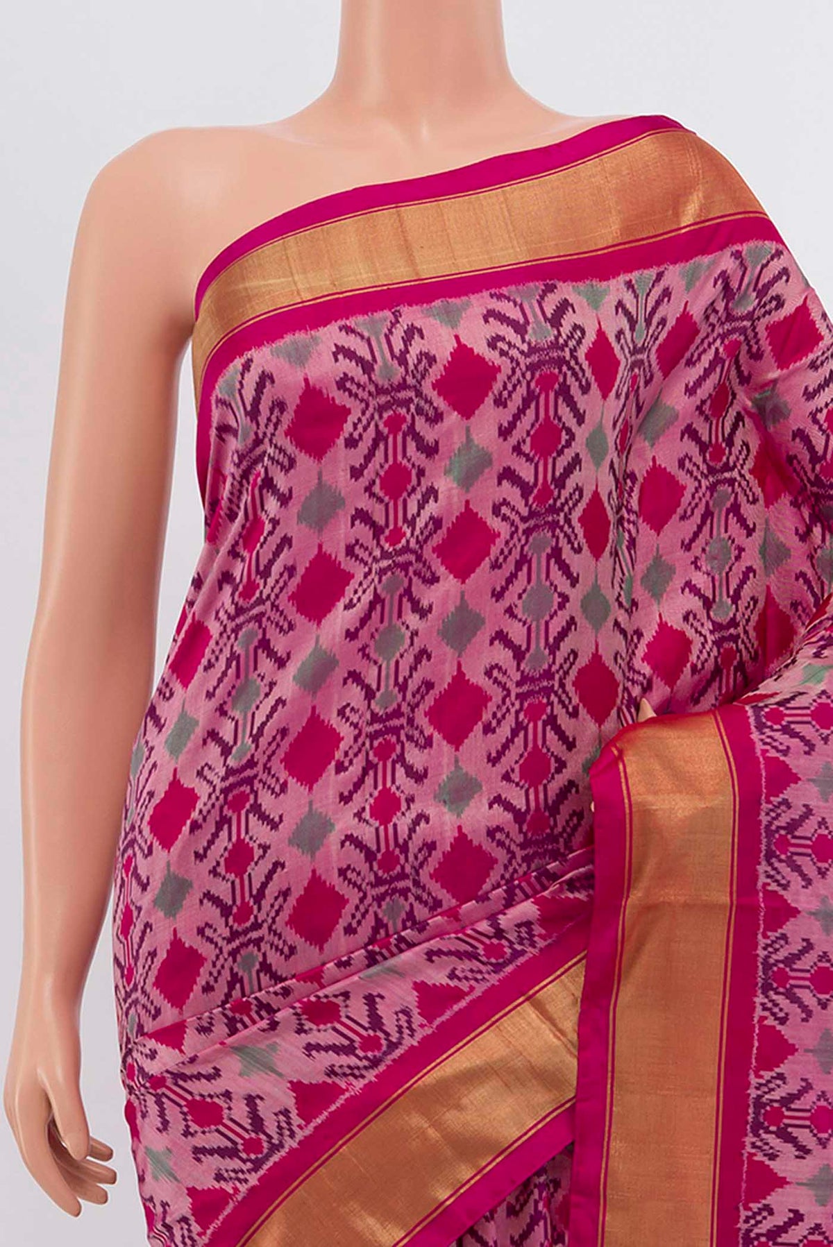 Border image of Rani Pink Pochampally Silk Saree with Ikat Print on the body and Zari Border