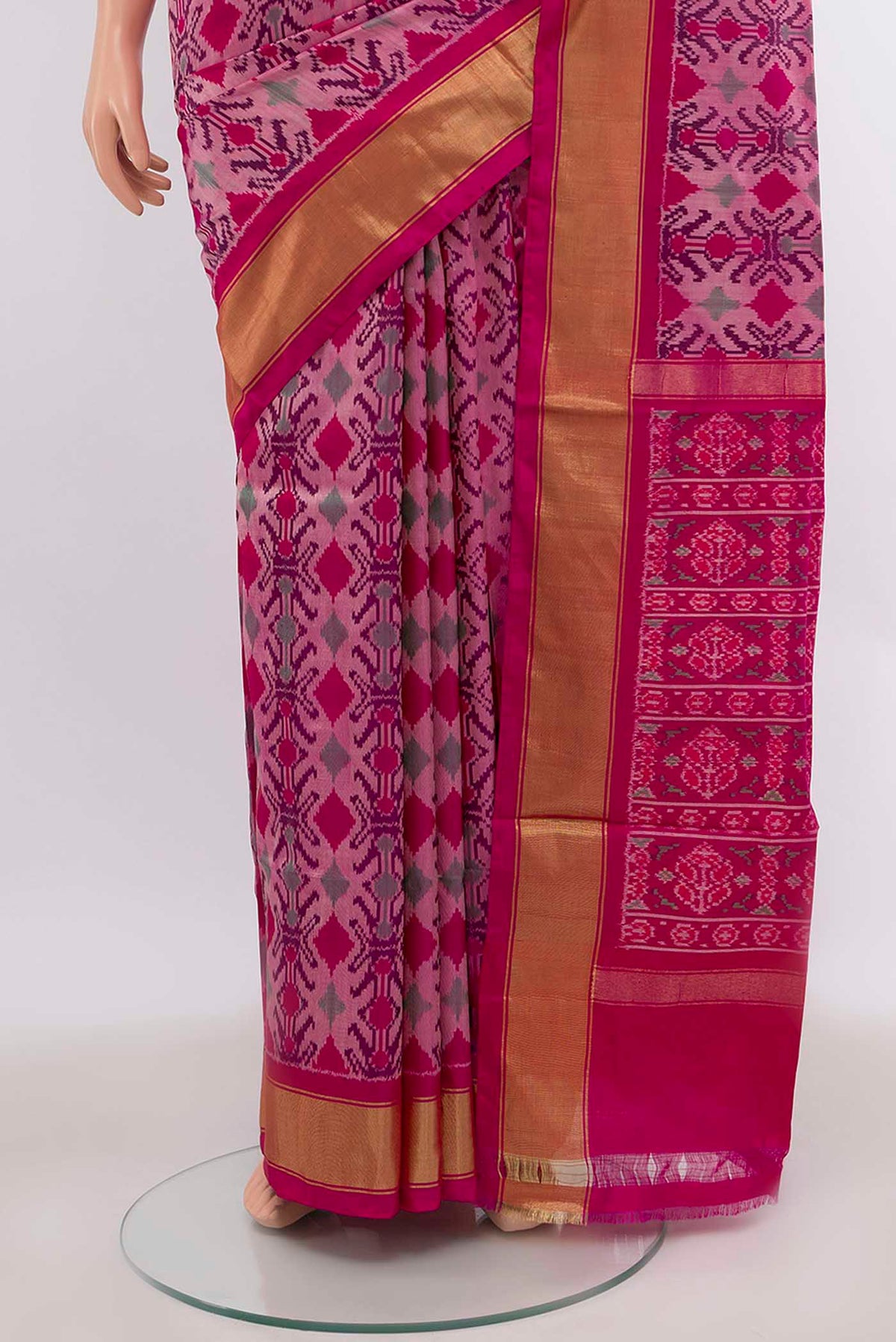 Pleats and pallu of Rani Pink Pochampally Silk Saree with Ikat Print on the body and Zari Border