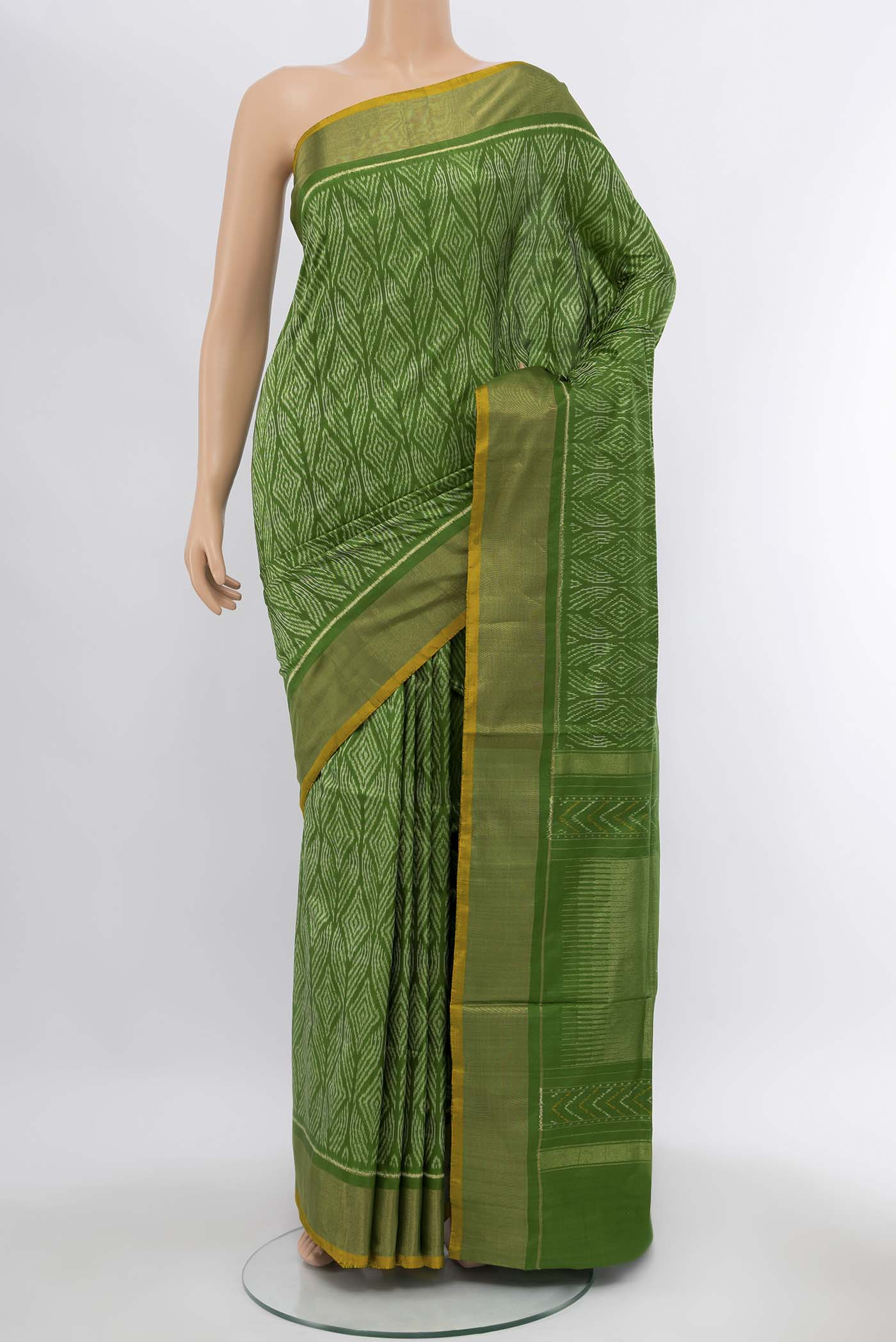 Green Pochampally Silk Saree with Zari Brocade on the body and Silk Border displayed on a mannequin