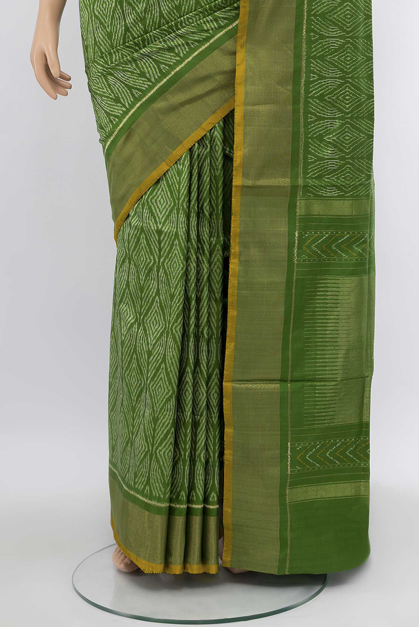 Pleats and pallu of Green Pochampally Silk Saree with Zari Brocade on the body and Silk Border
