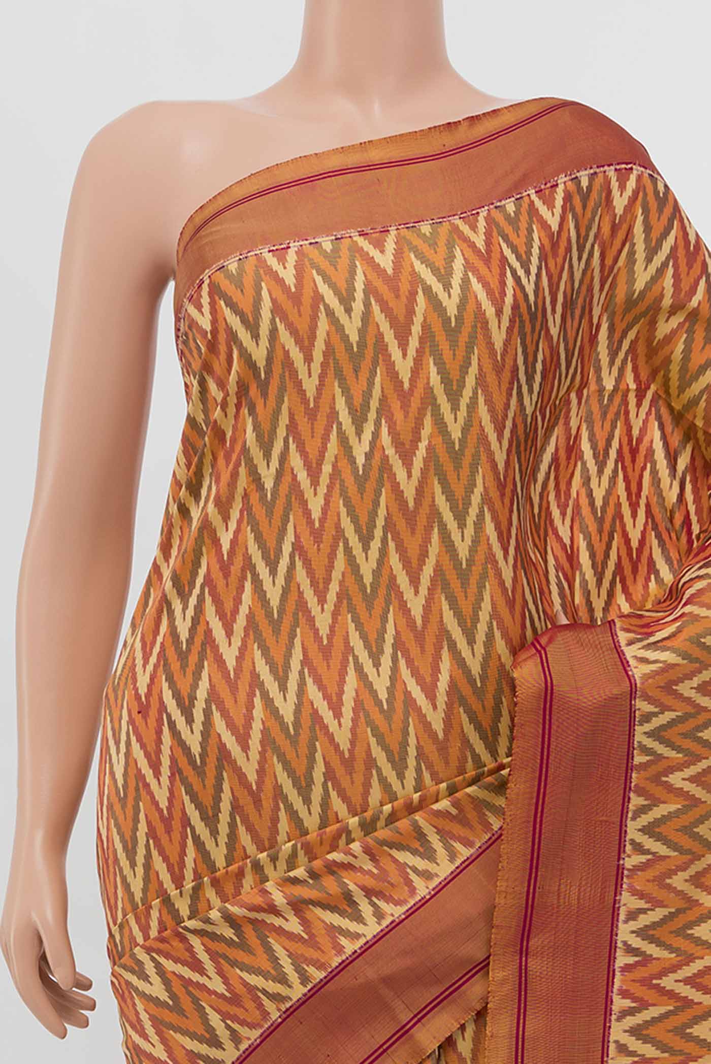 Border image of Orange Pochampally Silk Saree with Ikat Print on the body and Silk Border