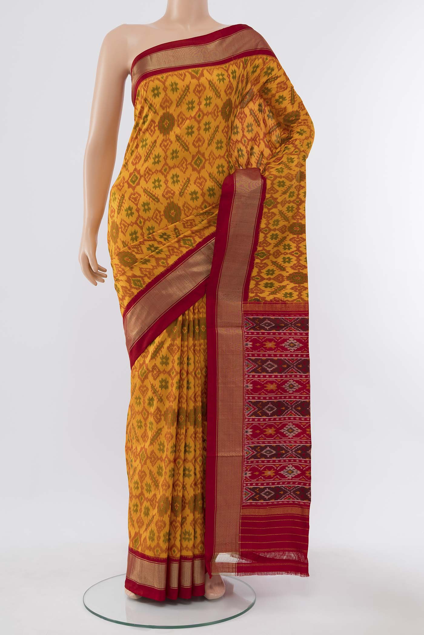 Mustard Pochampally Silk Saree with Zari Butta on the body and Silk Border displayed on a mannequin