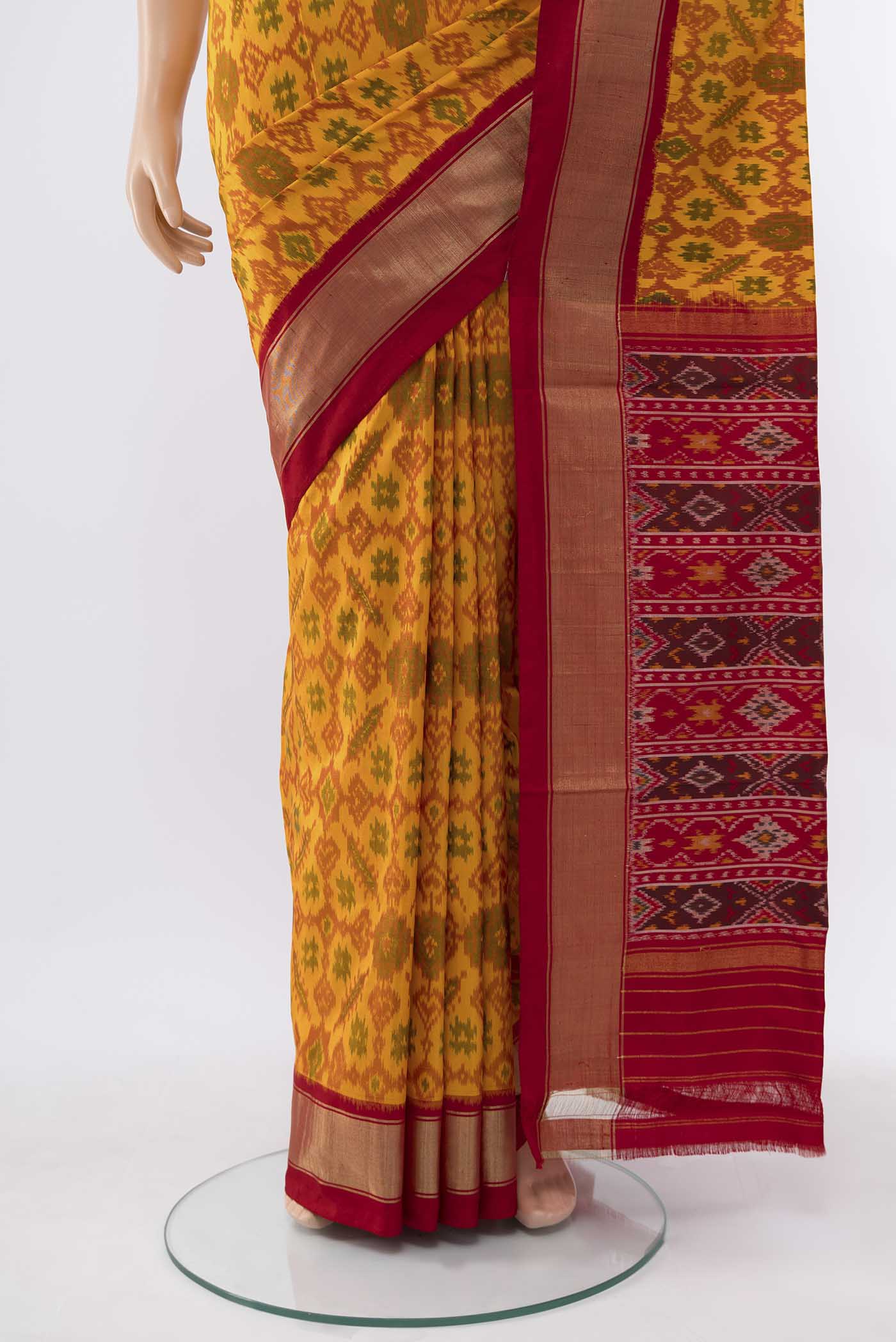 Pleats and pallu of Mustard Pochampally Silk Saree with Zari Butta on the body and Silk Border