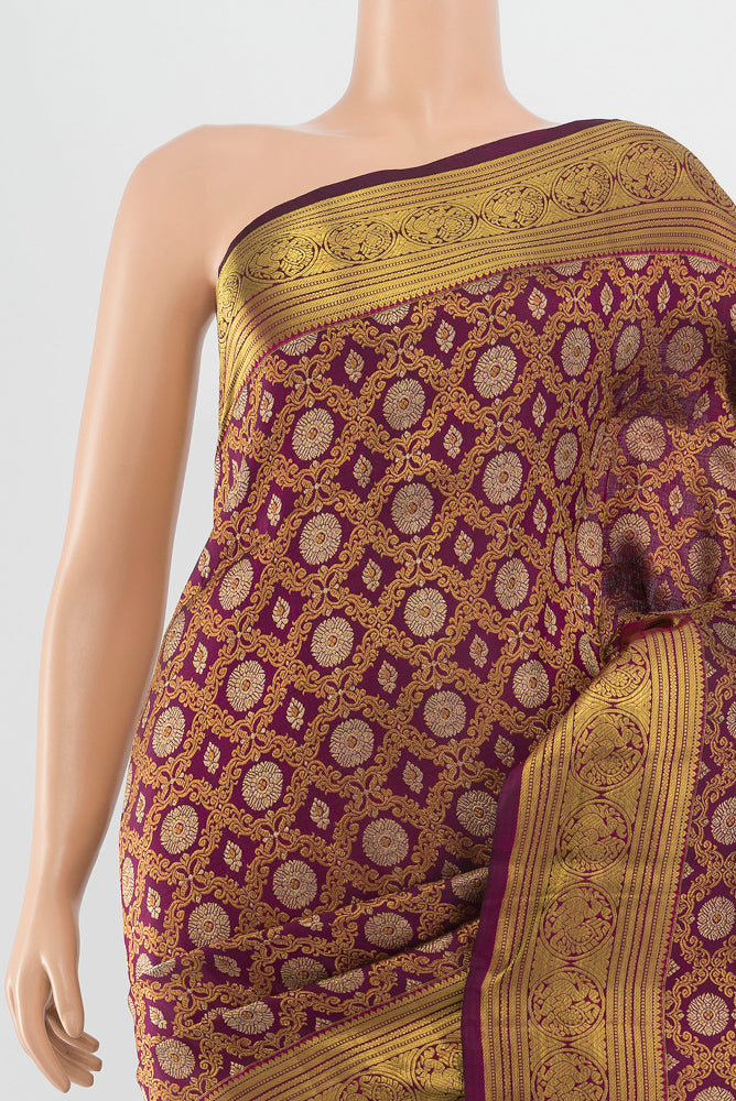 Border image of Purple Kanchipuram Silk Saree with Zari Butta on the body and Silk Border. 