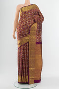 Purple Kanchipuram Silk Saree with Zari Butta on the body and Silk Border.  displayed on a mannequin