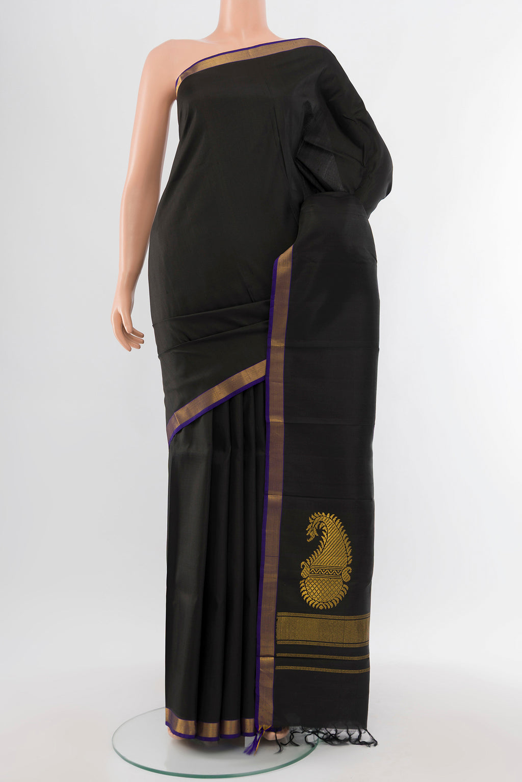 Pure Silk Pure Zari Black Kanjivaram Saree with Plain Body and Silk Border.  displayed on a mannequin