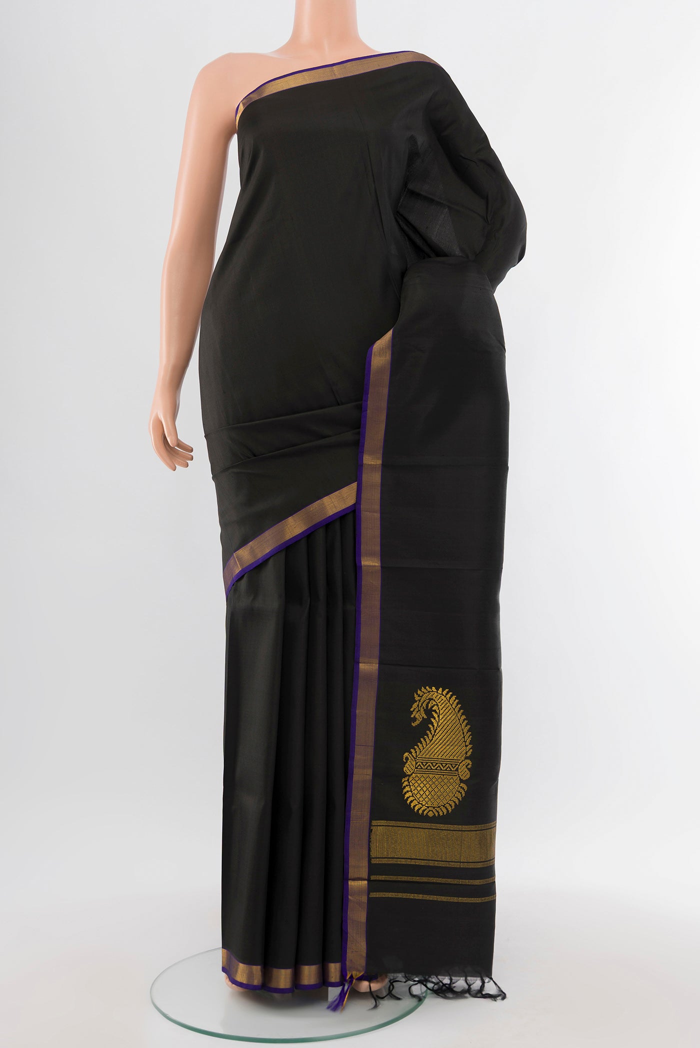 Pure Silk Pure Zari Black Kanjivaram Saree with Plain Body and Silk Border.  displayed on a mannequin