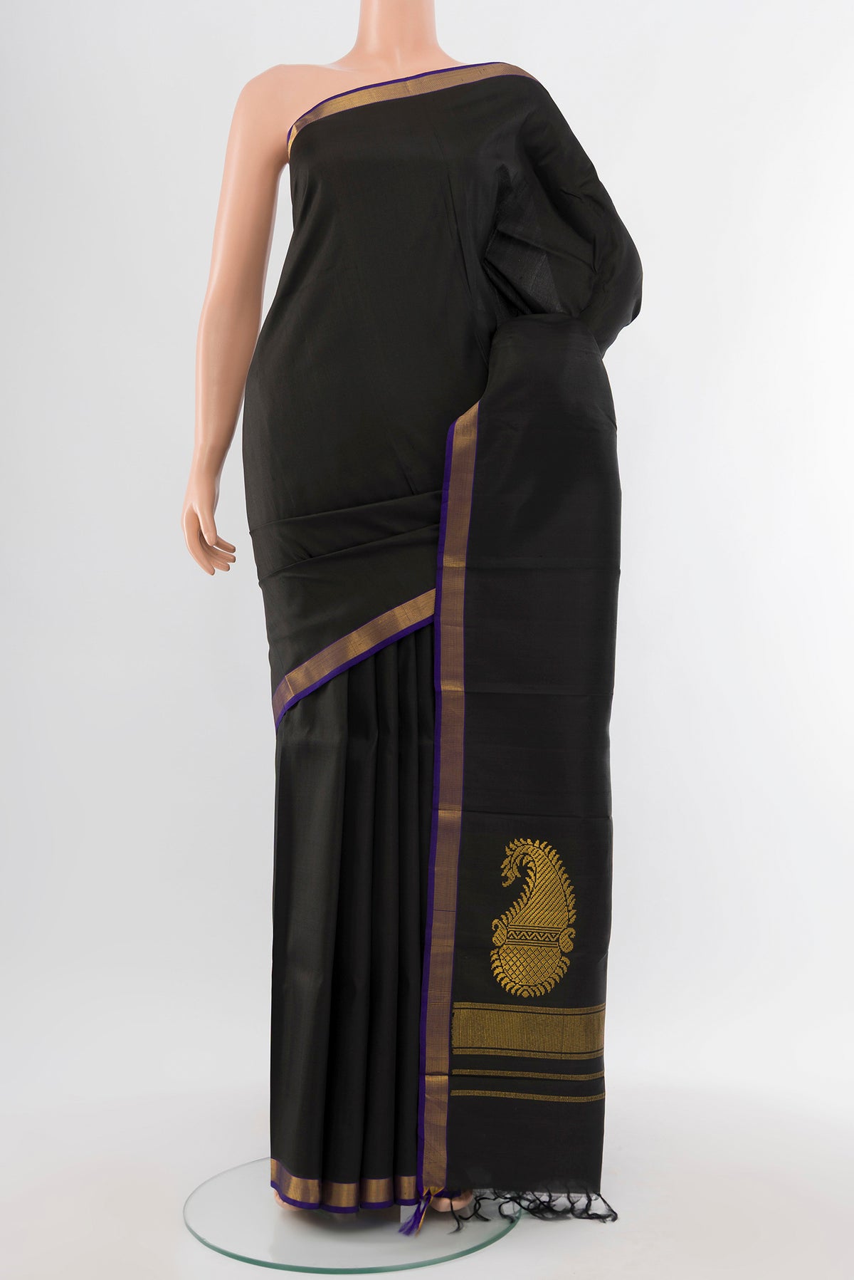 Pure Silk Pure Zari Black Kanjivaram Saree with Plain Body and Silk Border.  displayed on a mannequin