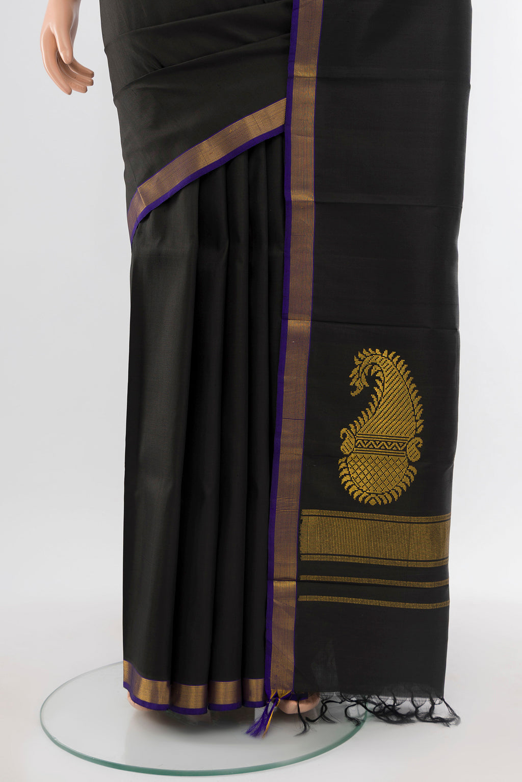 Pleats and pallu of Pure Silk Pure Zari Black Kanjivaram Saree with Plain Body and Silk Border. 
