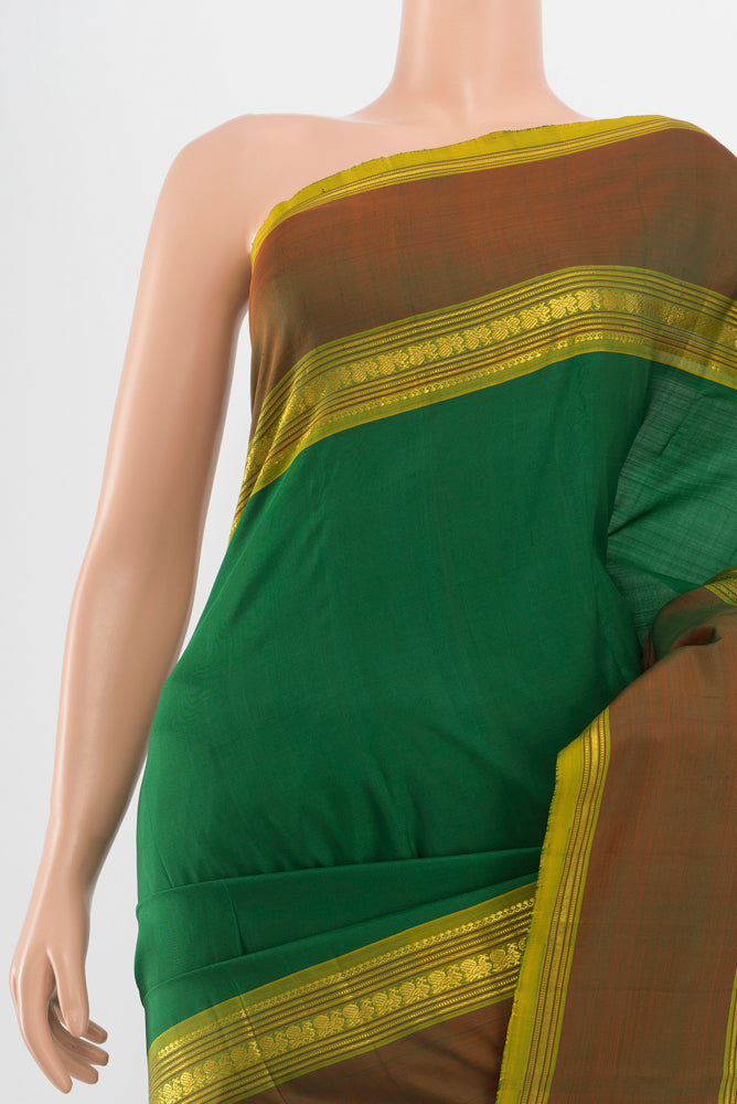 Border image of Pure Silk Pure Zari Light Green Kanchipuram Saree with Zari Butta on the body and Silk Border. 