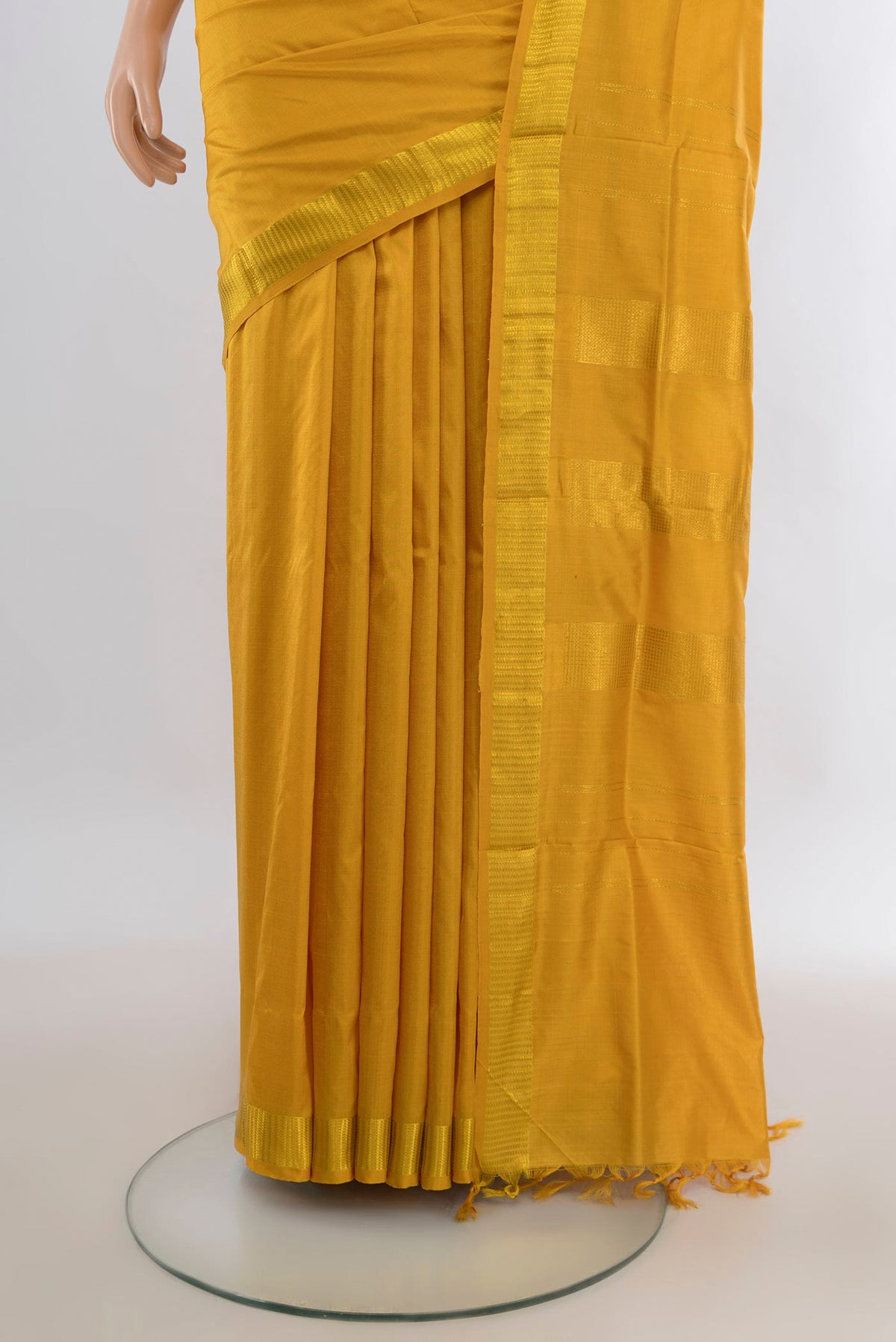 Pleats and pallu of Pure Silk Mustard Kanjivaram Nine Yards Saree with Plain Body and Zari Border. 