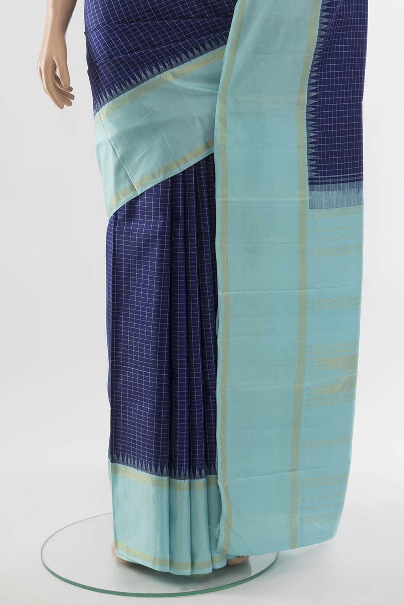 Pleats and pallu of Navy Blue Kanjivaram Silk Saree with Zari Butta on the body and Silk Border. 
