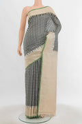 Multi Color Gadwal Silk Saree with Zari Butta on the body and Silk Border.  displayed on a mannequin