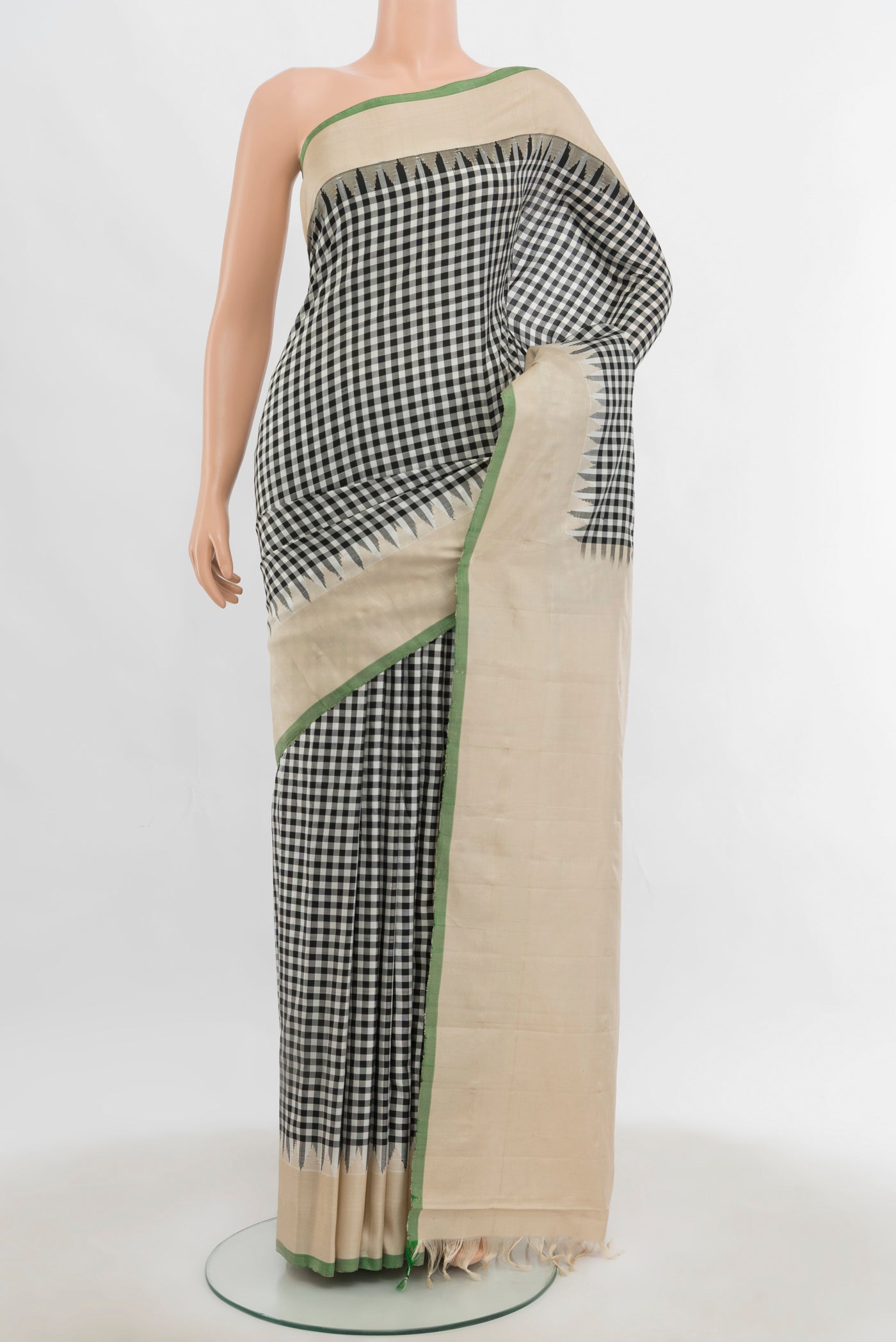 Multi Color Gadwal Silk Saree with Zari Butta on the body and Silk Border.  displayed on a mannequin